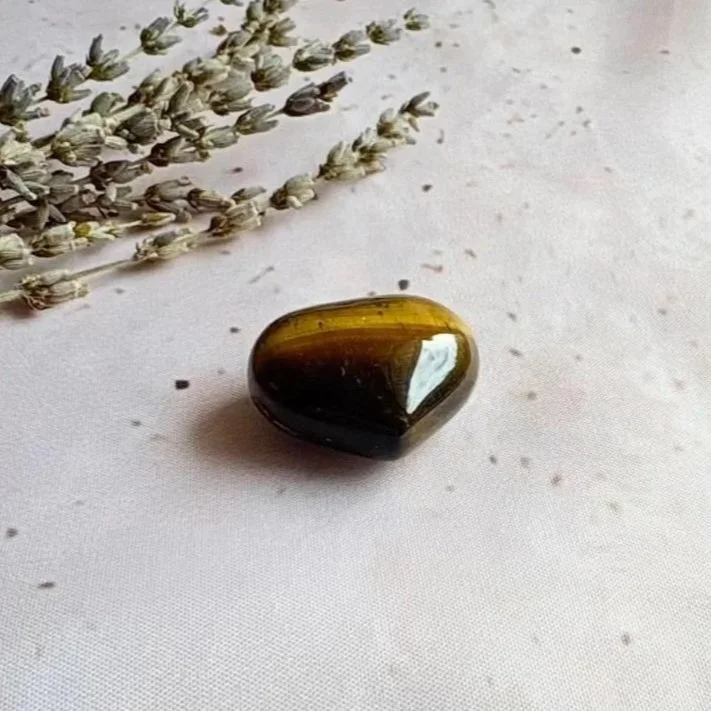 Polished Tiger's Eye crystal puff heart displaying natural silky shimmer