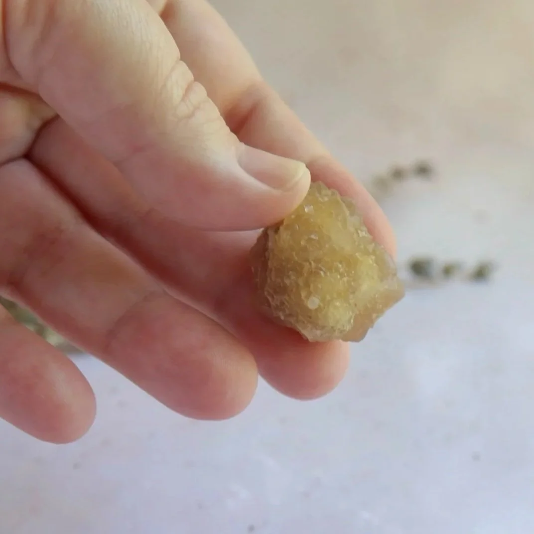 Small rough natural Citrine specimen showing its warm golden colour