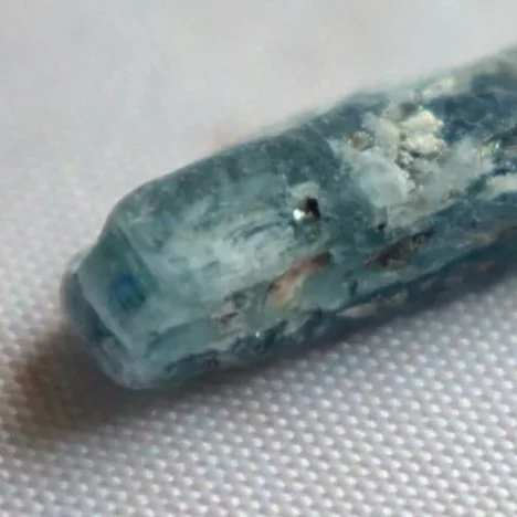 Close-up of the blue-grey bladed texture of a Blue Kyanite mineral specimen.