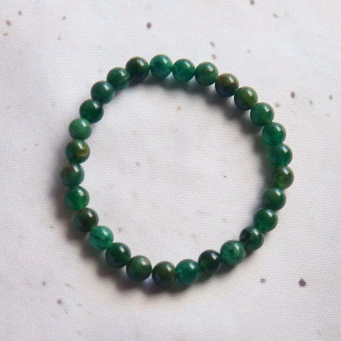 Australian Fuchsite bead bracelet featuring polished green 6mm beads.