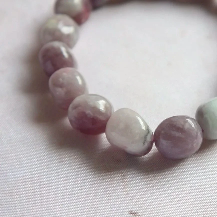 Natural Quartz and Pink Tourmaline crystal bead bracelet with translucent Quartz and pink mineral inclusions