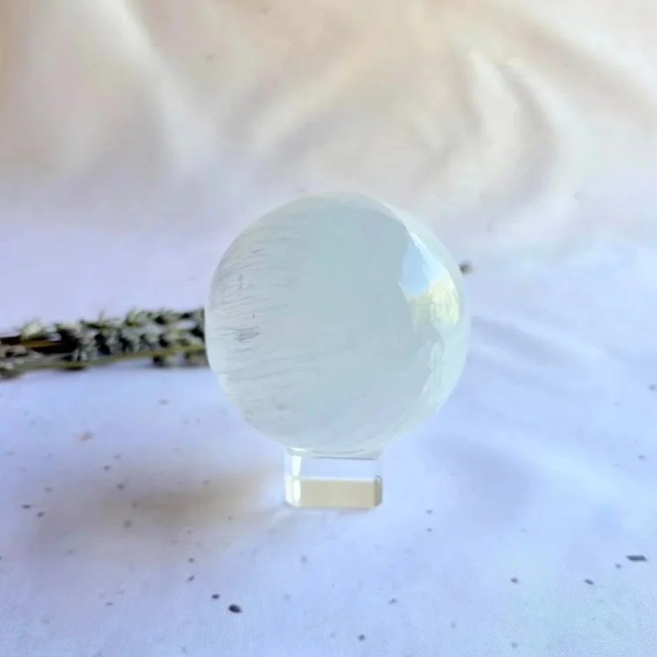 Natural Satin Spar sphere measuring approximately 6cm in diameter