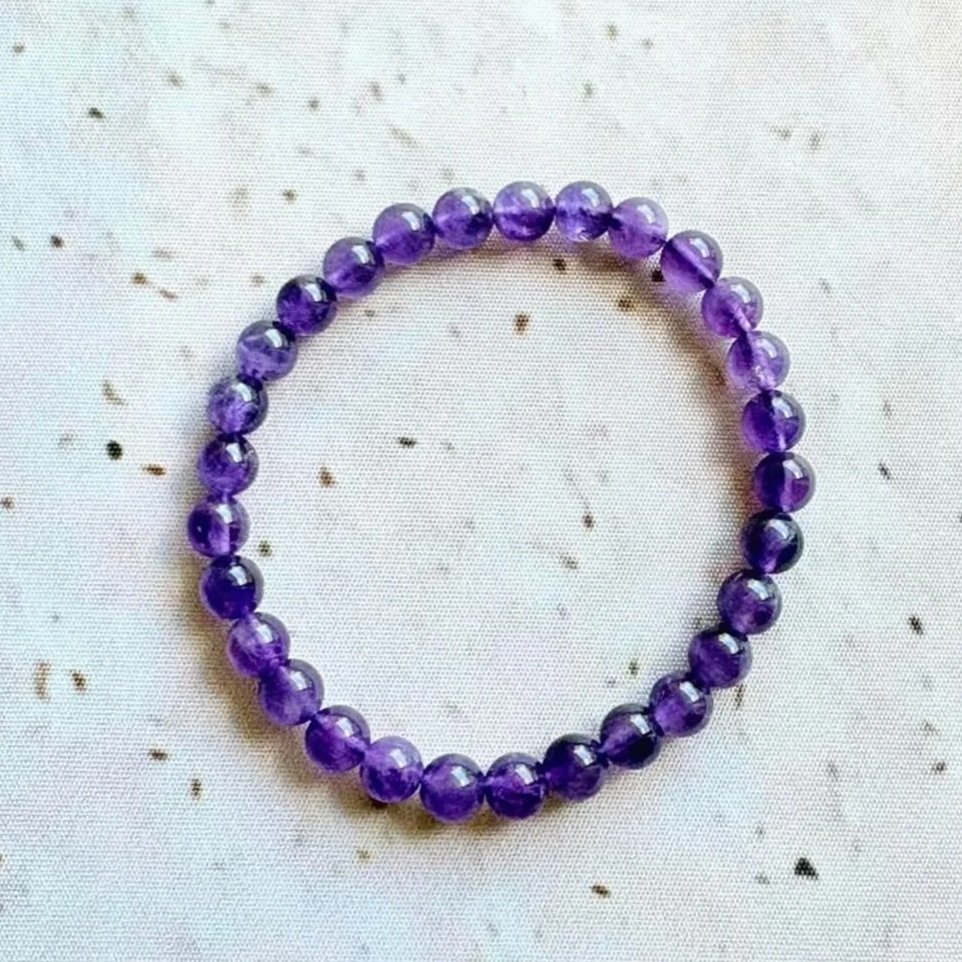 Natural Amethyst bead bracelet featuring polished 6mm round beads