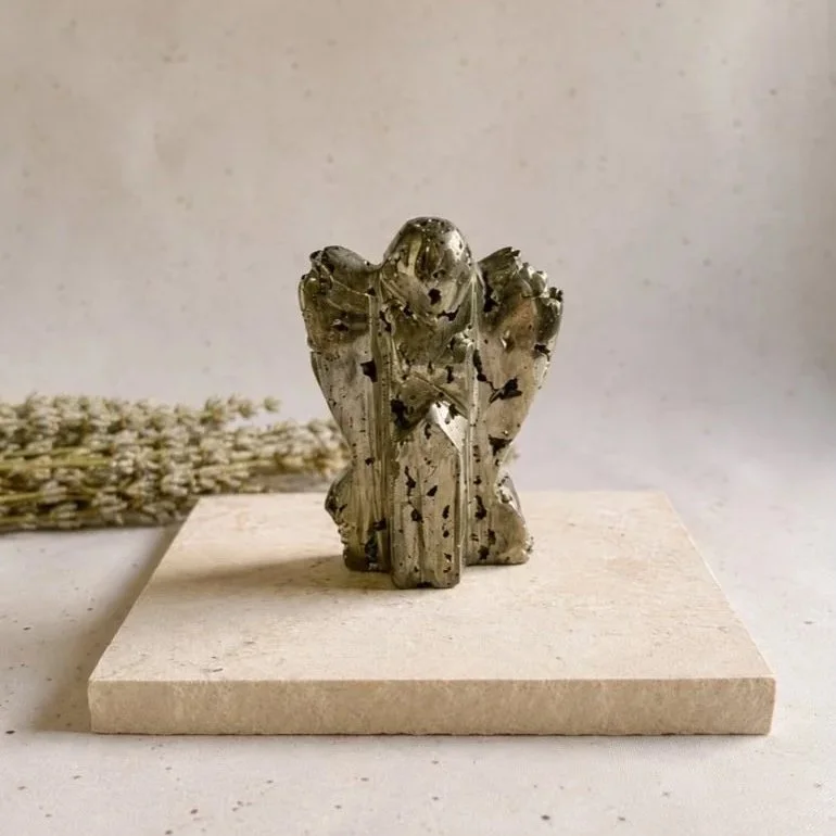 Pyrite crystal angel display piece showing natural golden shimmer