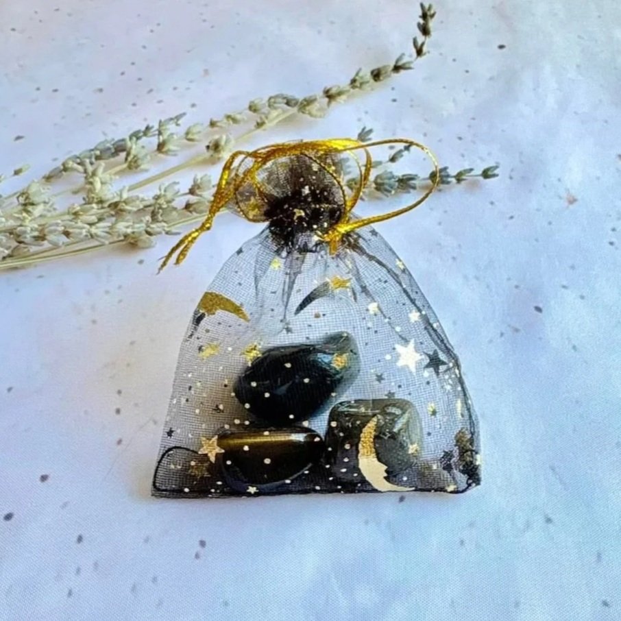 Safe & Sound protection crystal pack with Black Obsidian, Tiger's Eye, and Smoky Quartz tumbles