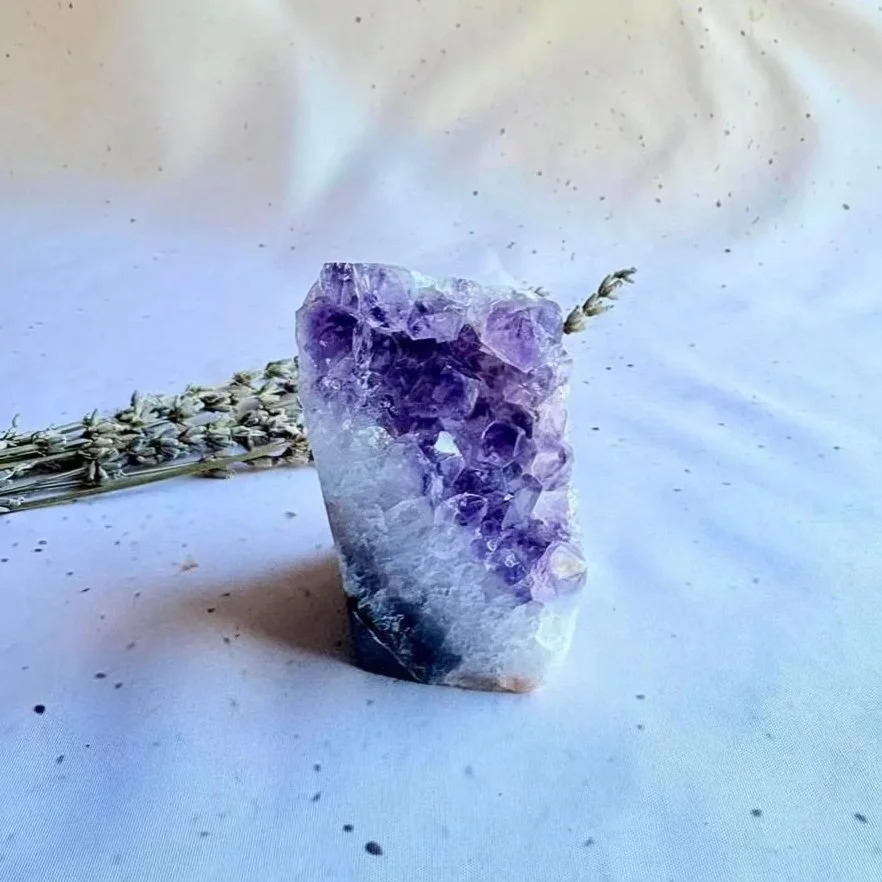 Exact Amethyst cluster measuring approximately 7cm high with natural crystal points