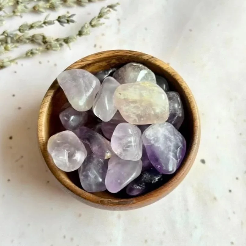 Amethyst tumble associated with intuition, calm, spiritual growth, and peaceful sleep