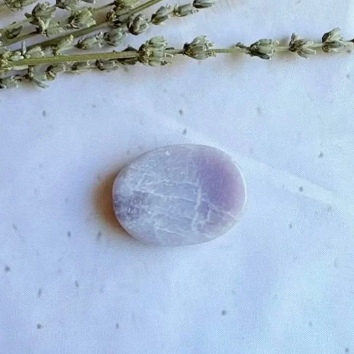 Natural Lepidolite oval worry stone with polished finish and thumb indentation