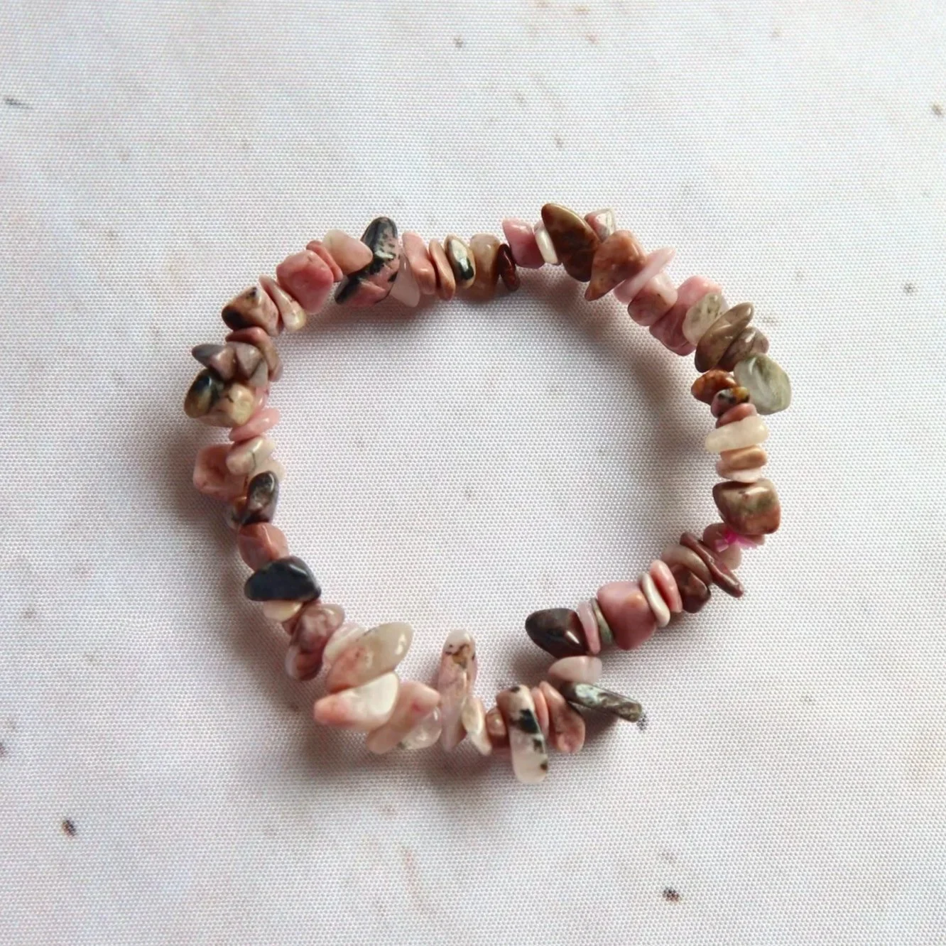 Rhodonite chip bead bracelet with natural pink and black mineral colouring