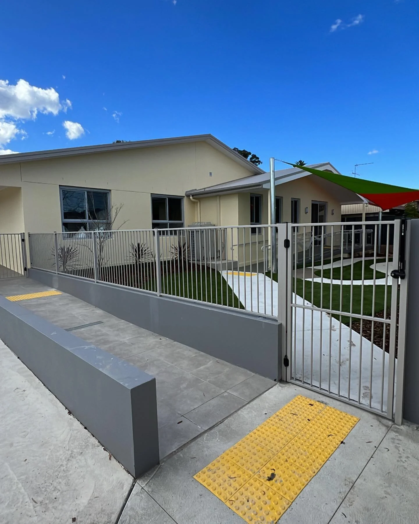 Newly built childcare centre required custom tubular fencing with child safety hinges and locks in order to meet regulations. 

@premiumfencingsolutions