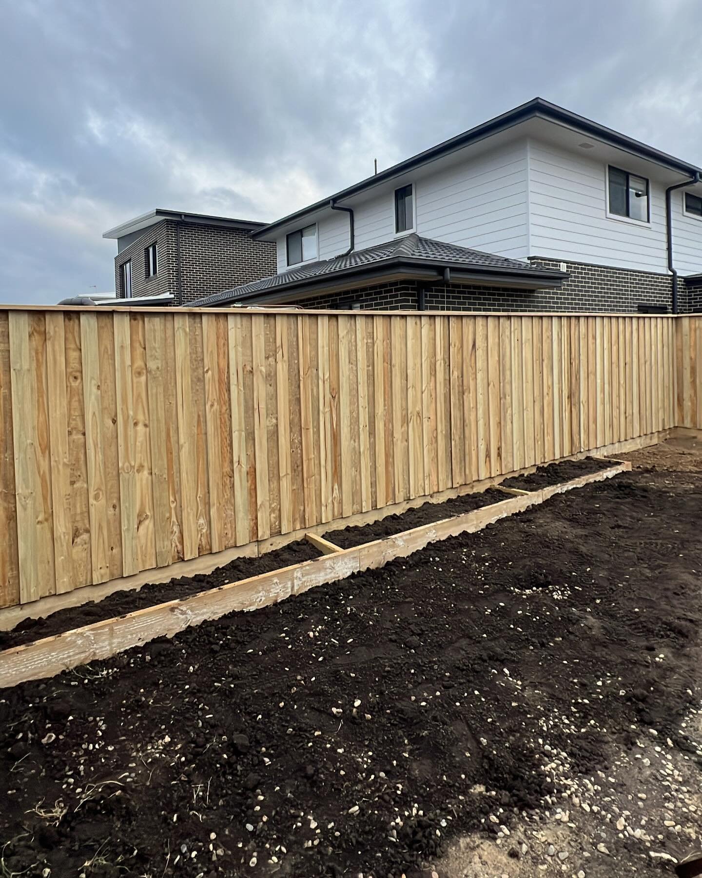 The team getting things done, rear &amp; right hand side fencing done. Timber lap and cap with steel posts &amp; 200MM sleeper giving a total height of 2M. 

@premuimfencingsolutons