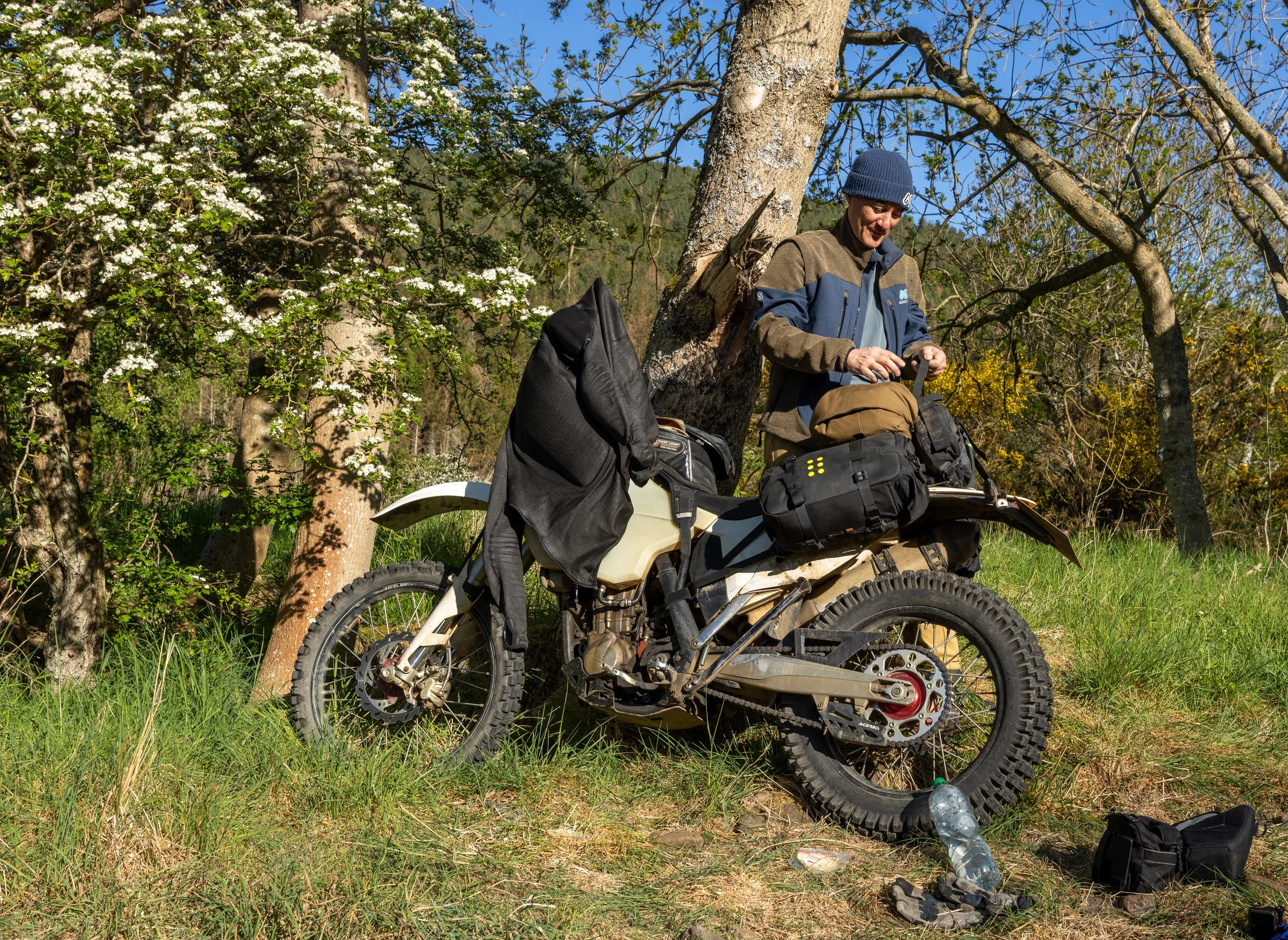 Greg packs his kit away. He's using a new Kriega OS Base on his KTM 450EXC. It took a while to get the setup right with the top roll bag but after a day of riding he eventually nailed it.