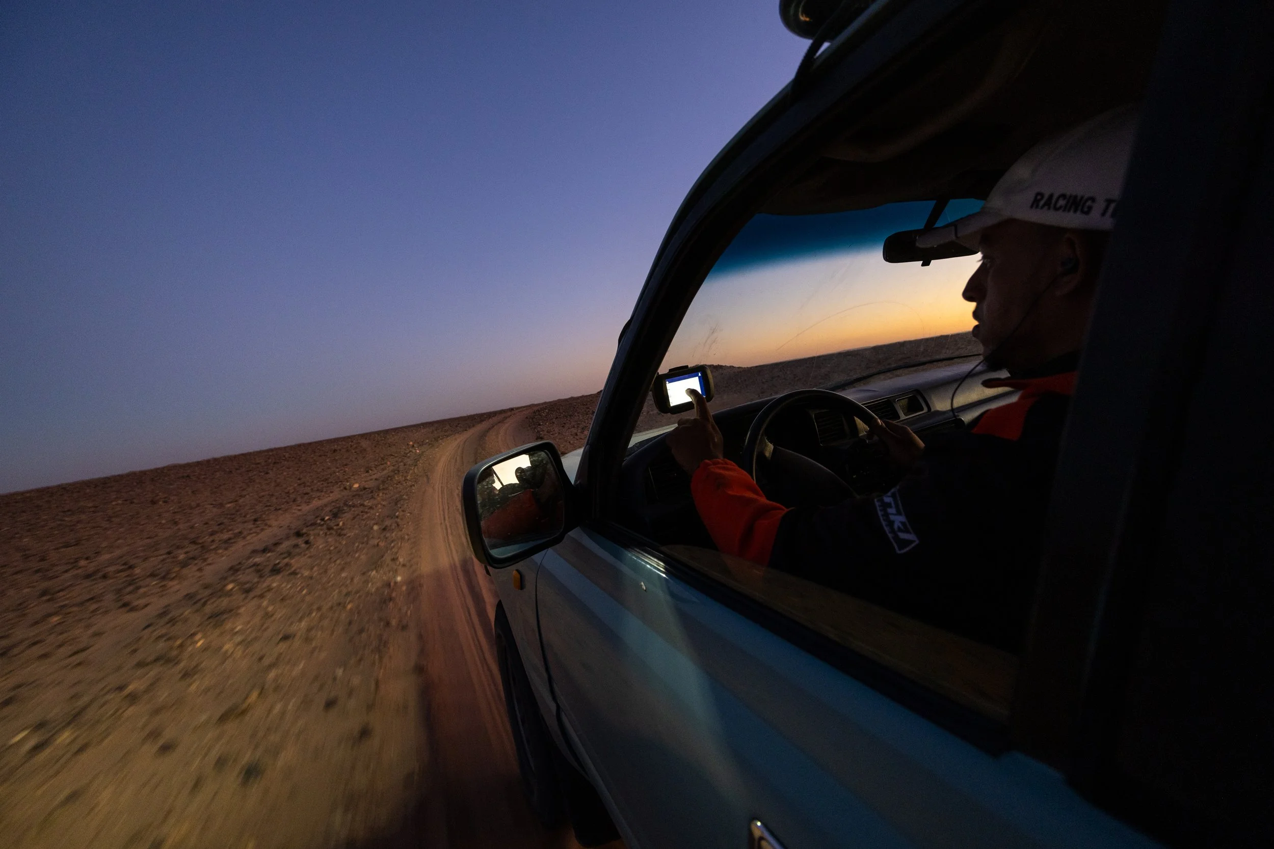 Hicham uses his sat nav to check he is on the correct track. With few landmarks it would be very easy to get lost.