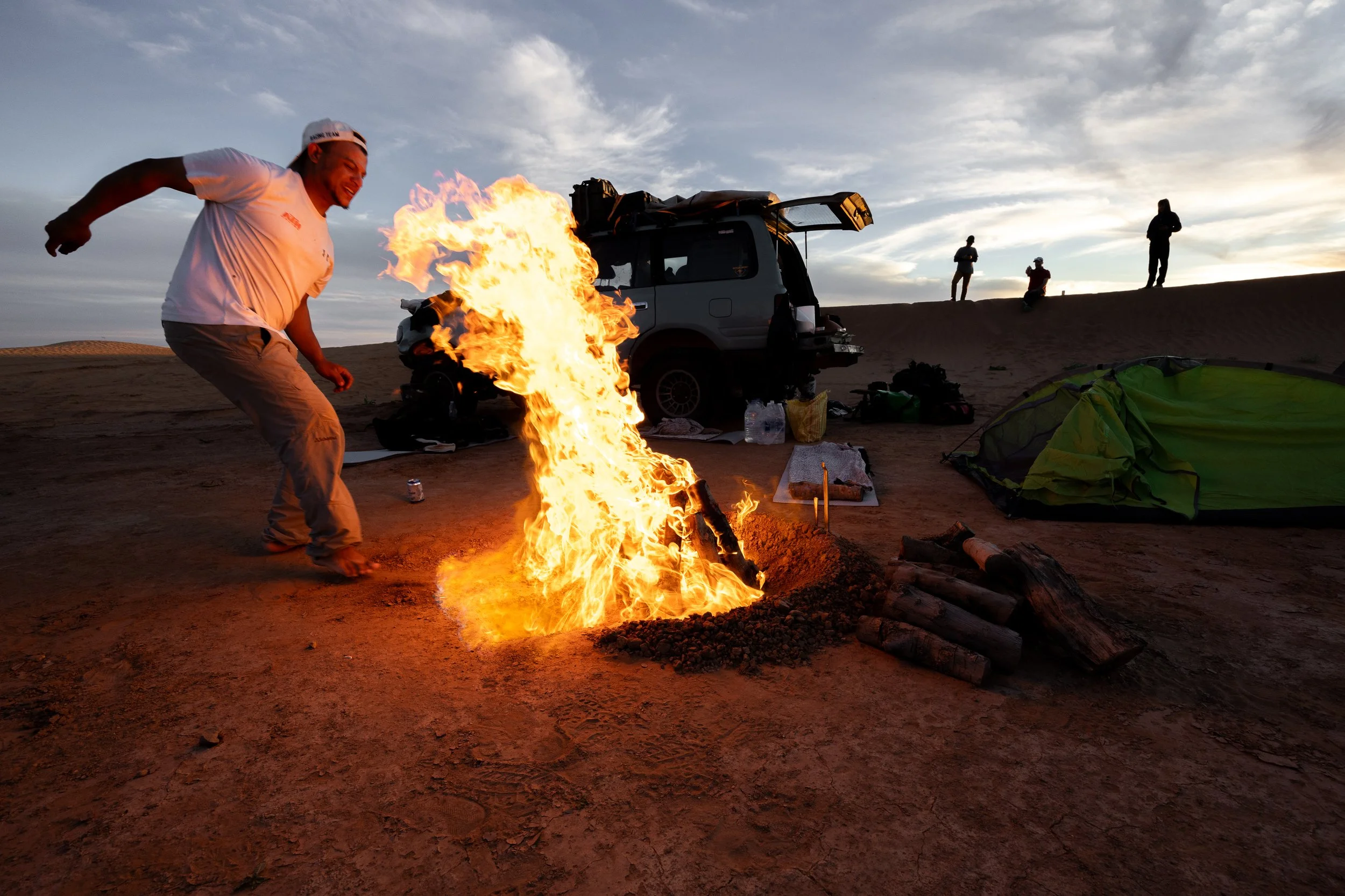 All the lessons we are taught as childern about how not to start a fire are set aside as Hicham gets his Tagine seat cook setup going the Moroccan way. All eyebrows escaped without a singe.