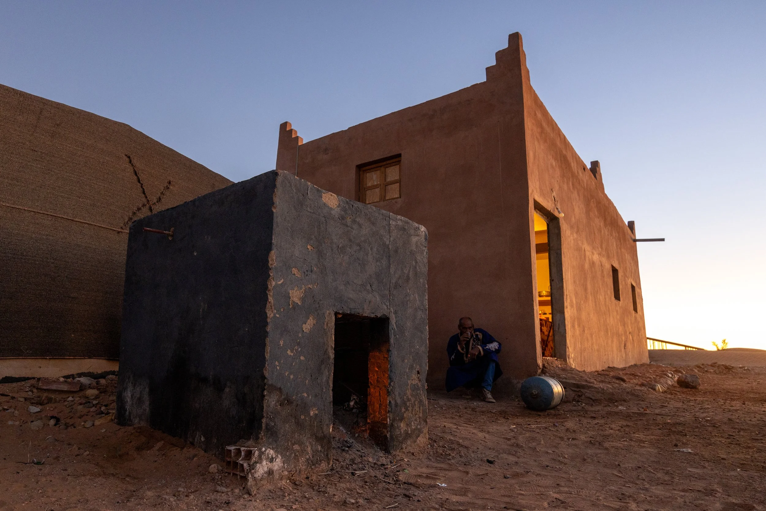 The clay oven is stoked before daybreak, ready to bake the days bread.