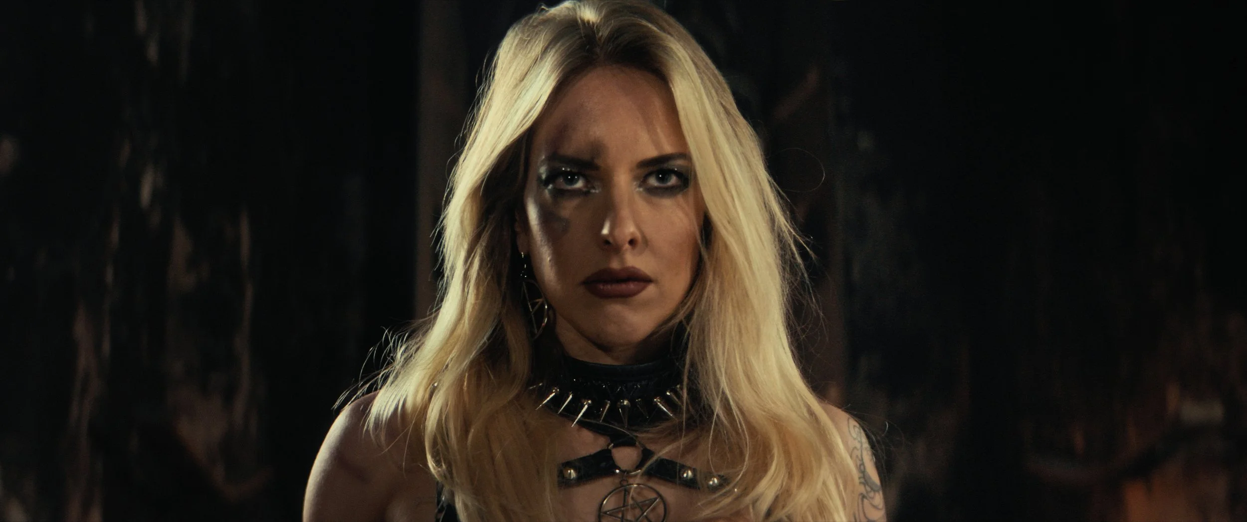 blonde woman looking at camera