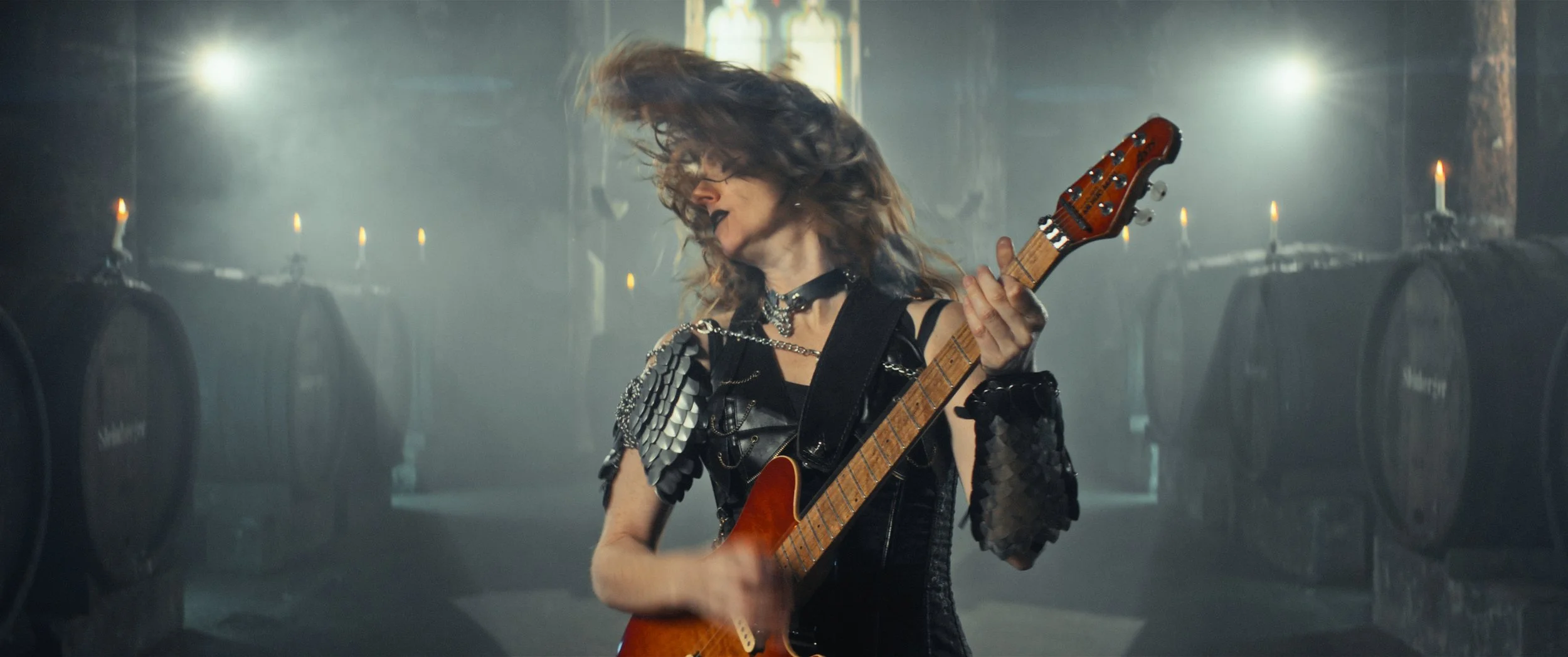 woman playing guitar