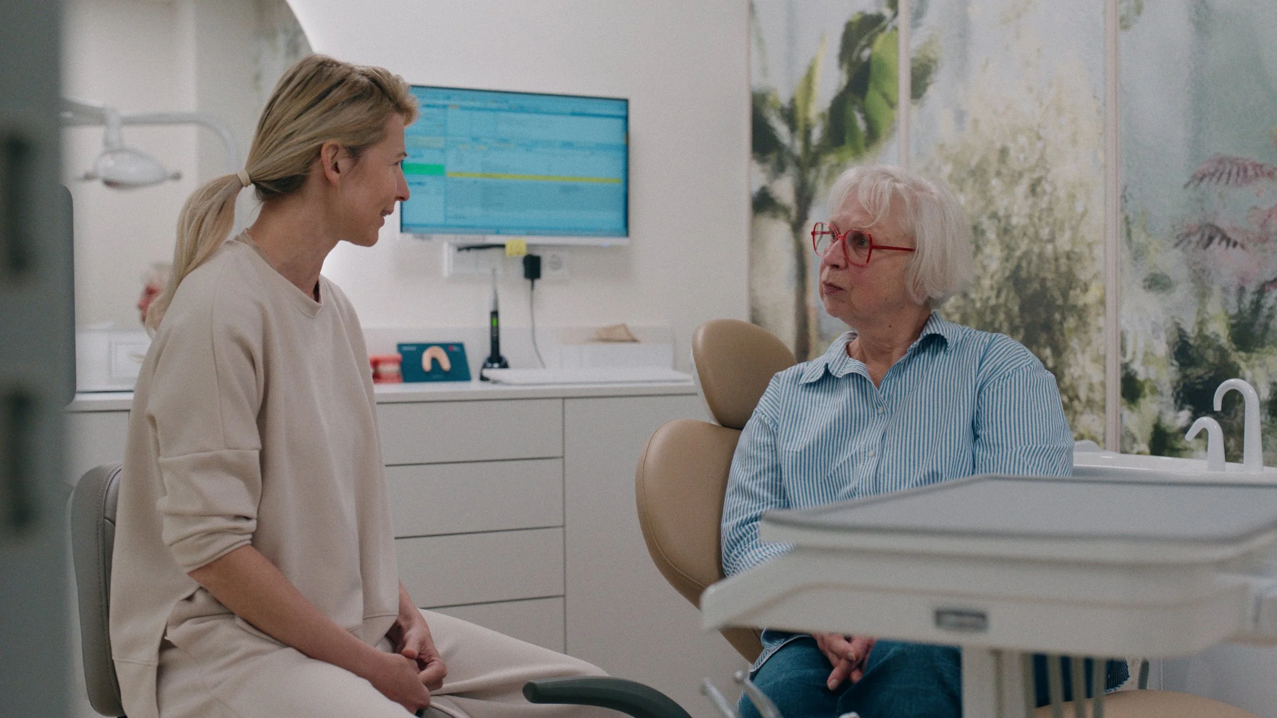 dentist talking to patient