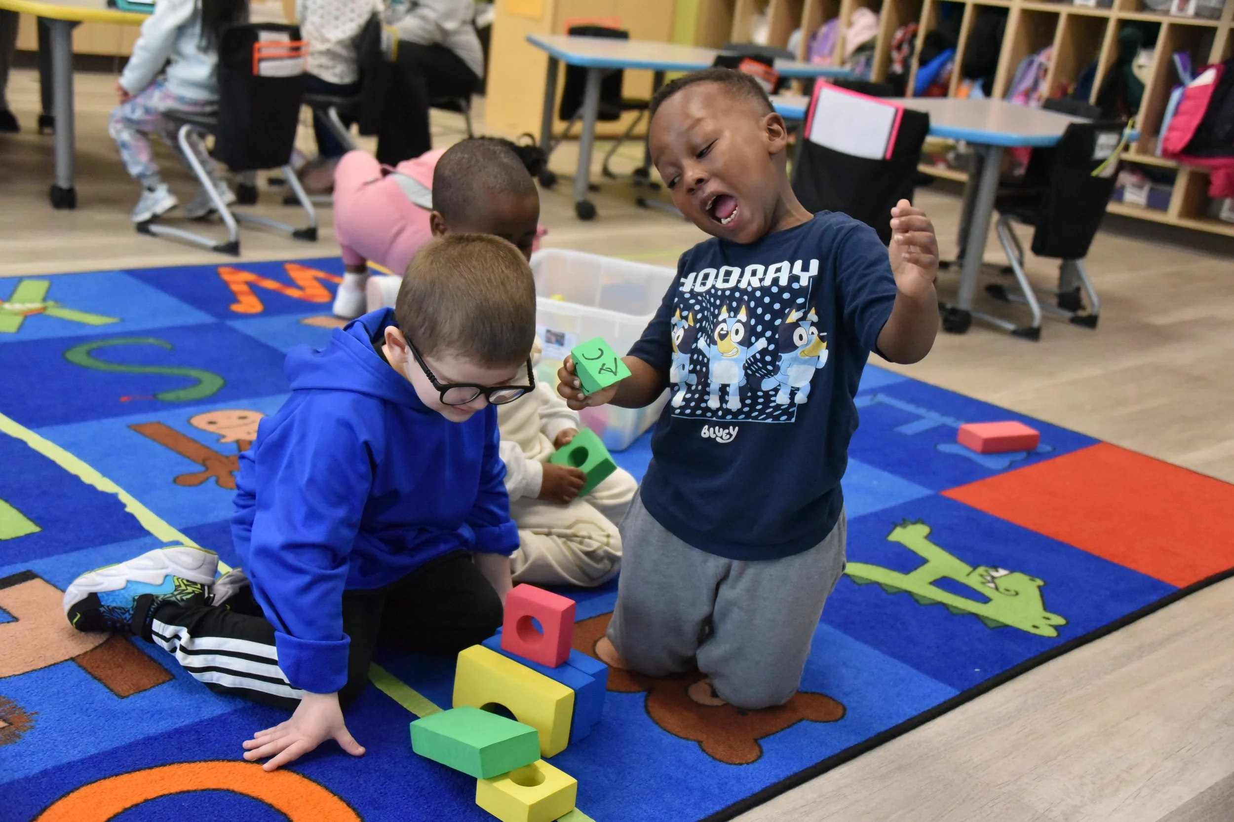 pre-k-students-building-with-foam-blocks.jpg