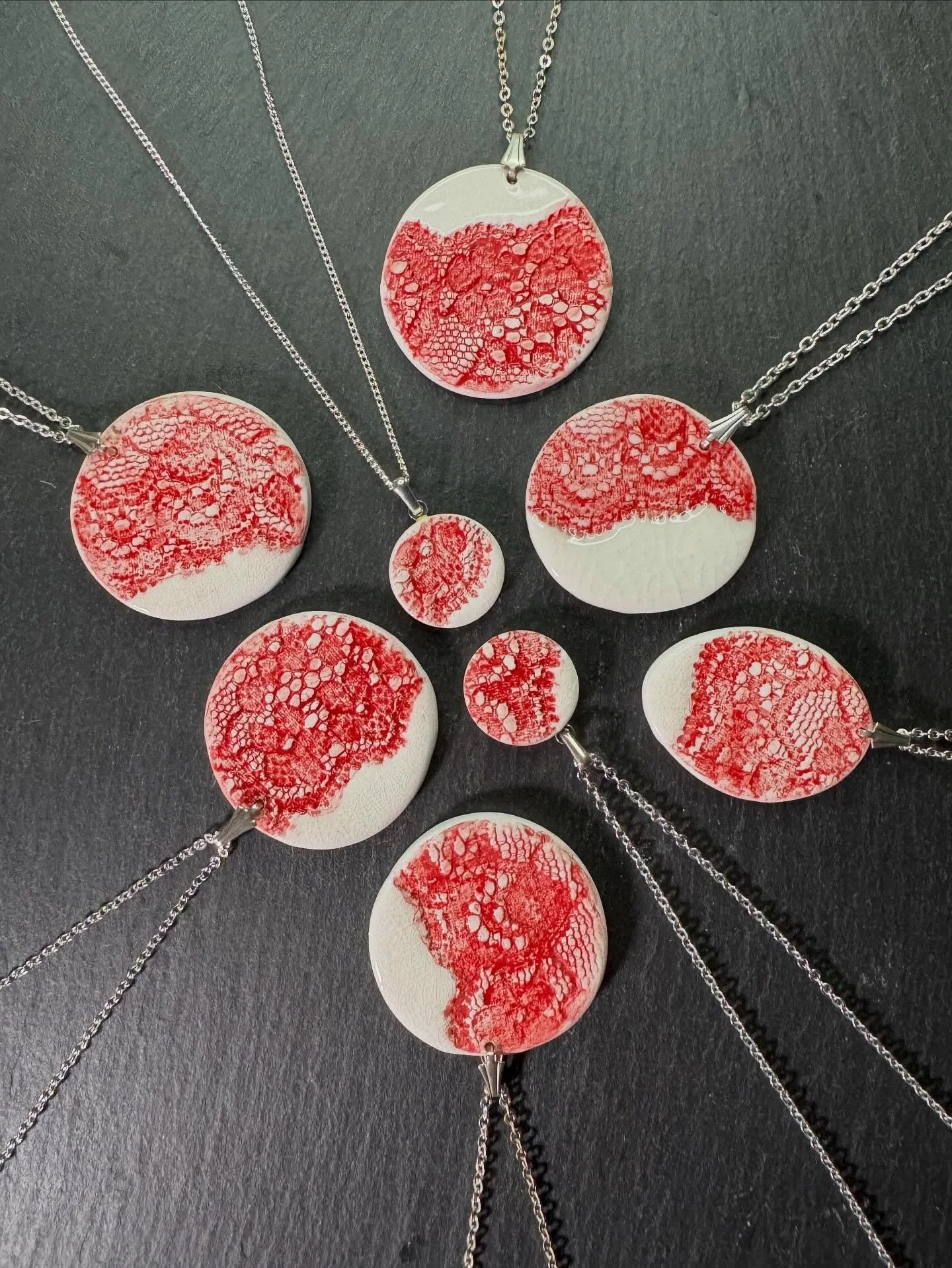 THIS WEEKS COLOUR IS RED. 
Thread and Trace
Impressions of lace, held in porcelain.

Inspired by the heritage of Nottingham lace and the beauty of handmade craft, this jewellery range captures the subtle interplay between texture, tone, and light.

A