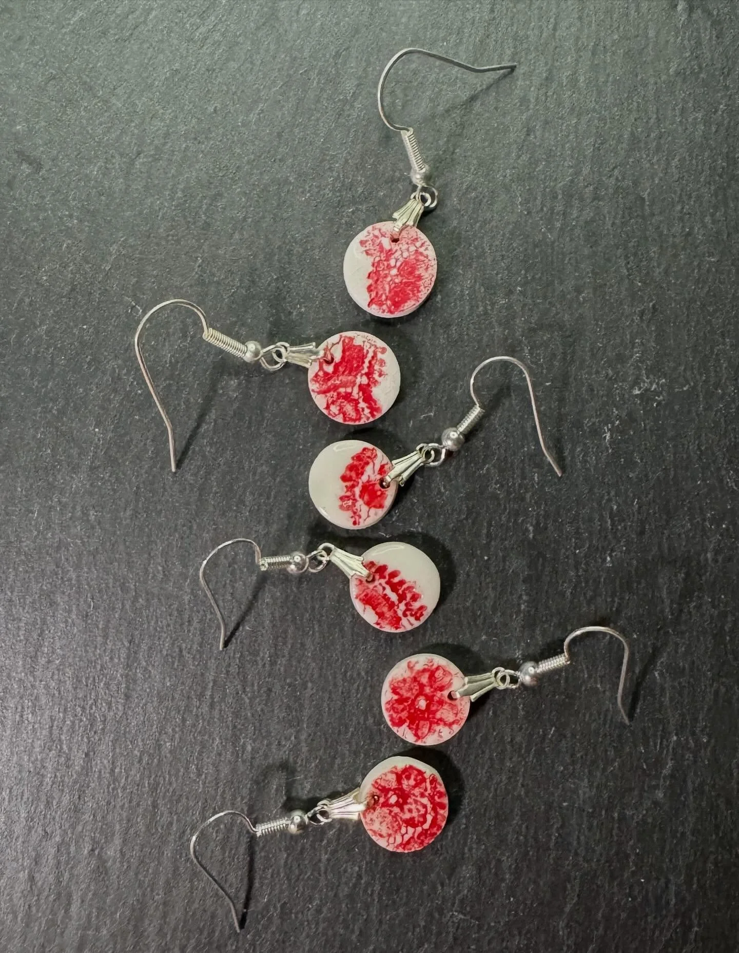 THIS WEEKS COLOUR IS RED. 
Thread and Trace
Impressions of lace, held in porcelain.

Inspired by the heritage of Nottingham lace and the beauty of handmade craft, this jewellery range captures the subtle interplay between texture, tone, and light.

A