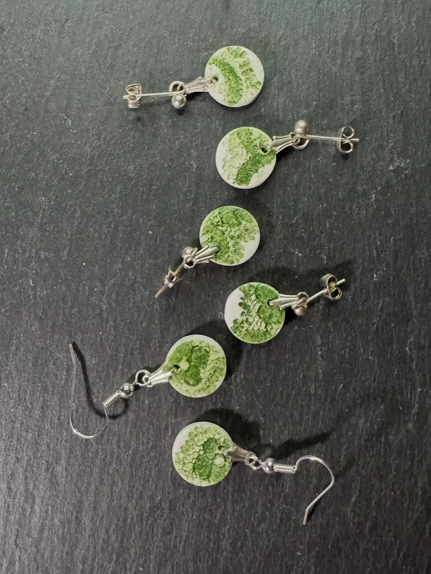 THIS WEEKS COLOUR IS GREEN. 
Thread and Trace
Impressions of lace, held in porcelain.

Inspired by the heritage of Nottingham lace and the beauty of handmade craft, this jewellery range captures the subtle interplay between texture, tone, and light.
