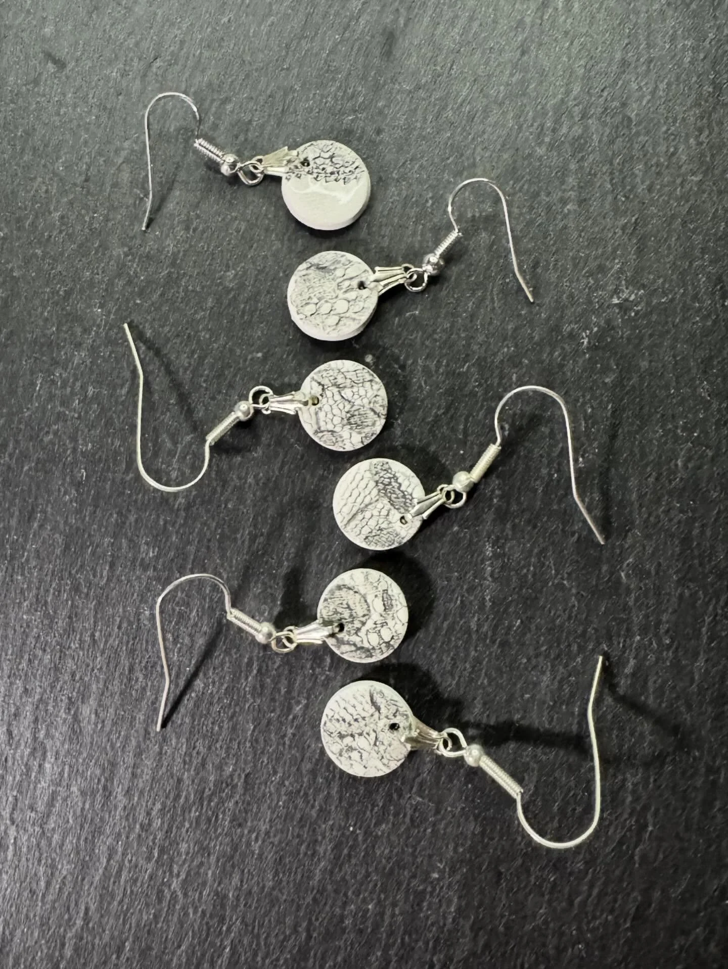 THIS WEEKS COLOUR IS BLACK
Thread and Trace
Impressions of lace, held in porcelain.

Inspired by the heritage of Nottingham lace and the beauty of handmade craft, this jewellery range captures the subtle interplay between texture, tone, and light.

A