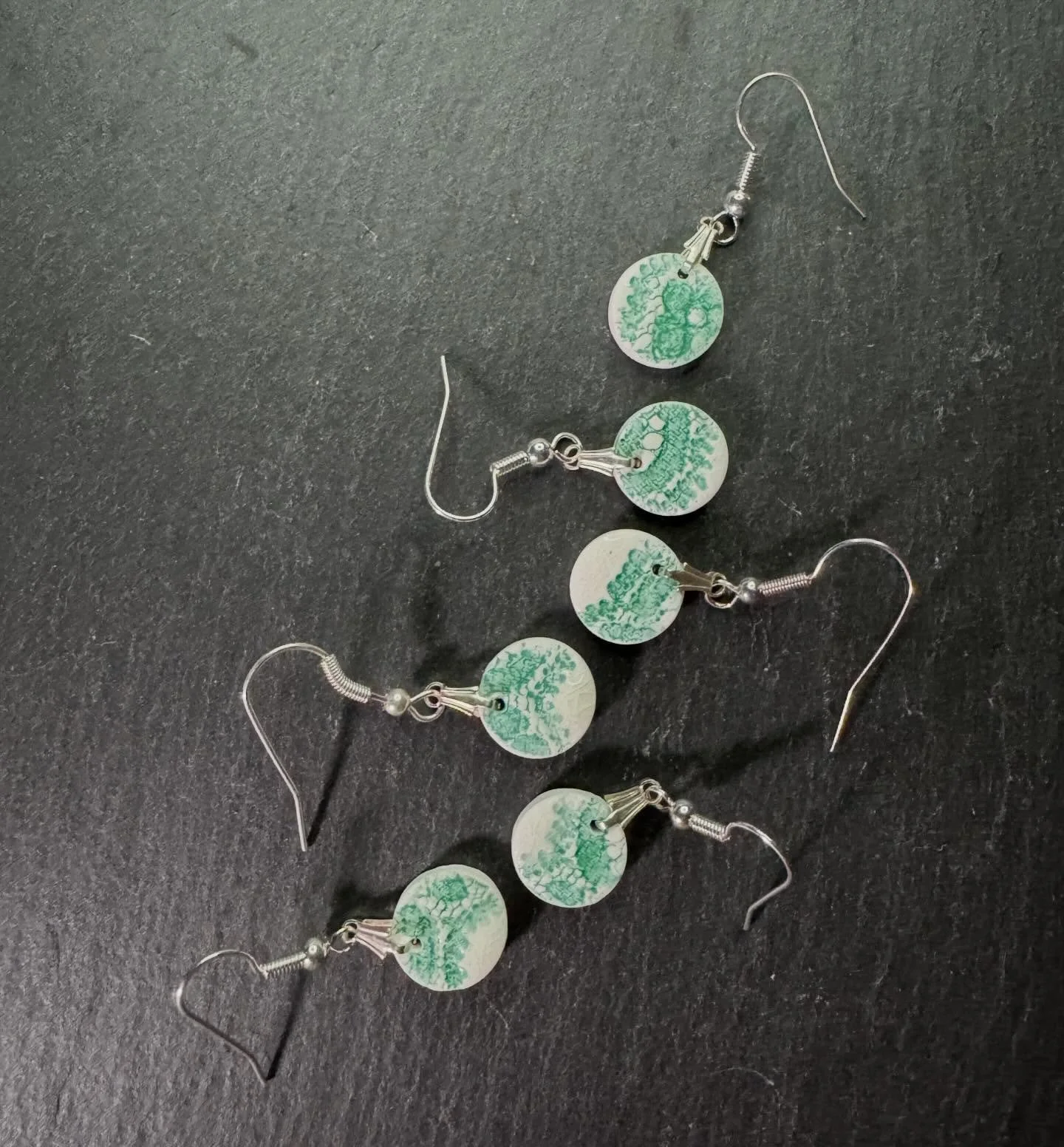 THIS WEEKS COLOUR IS JADE. 
Thread and Trace
Impressions of lace, held in porcelain.

Inspired by the heritage of Nottingham lace and the beauty of handmade craft, this jewellery range captures the subtle interplay between texture, tone, and light.

