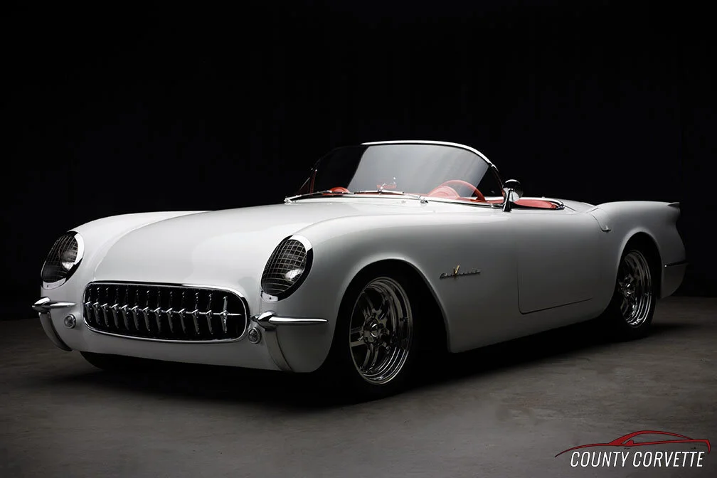 1955 Corvette Restomod with white paint and a red leather interior