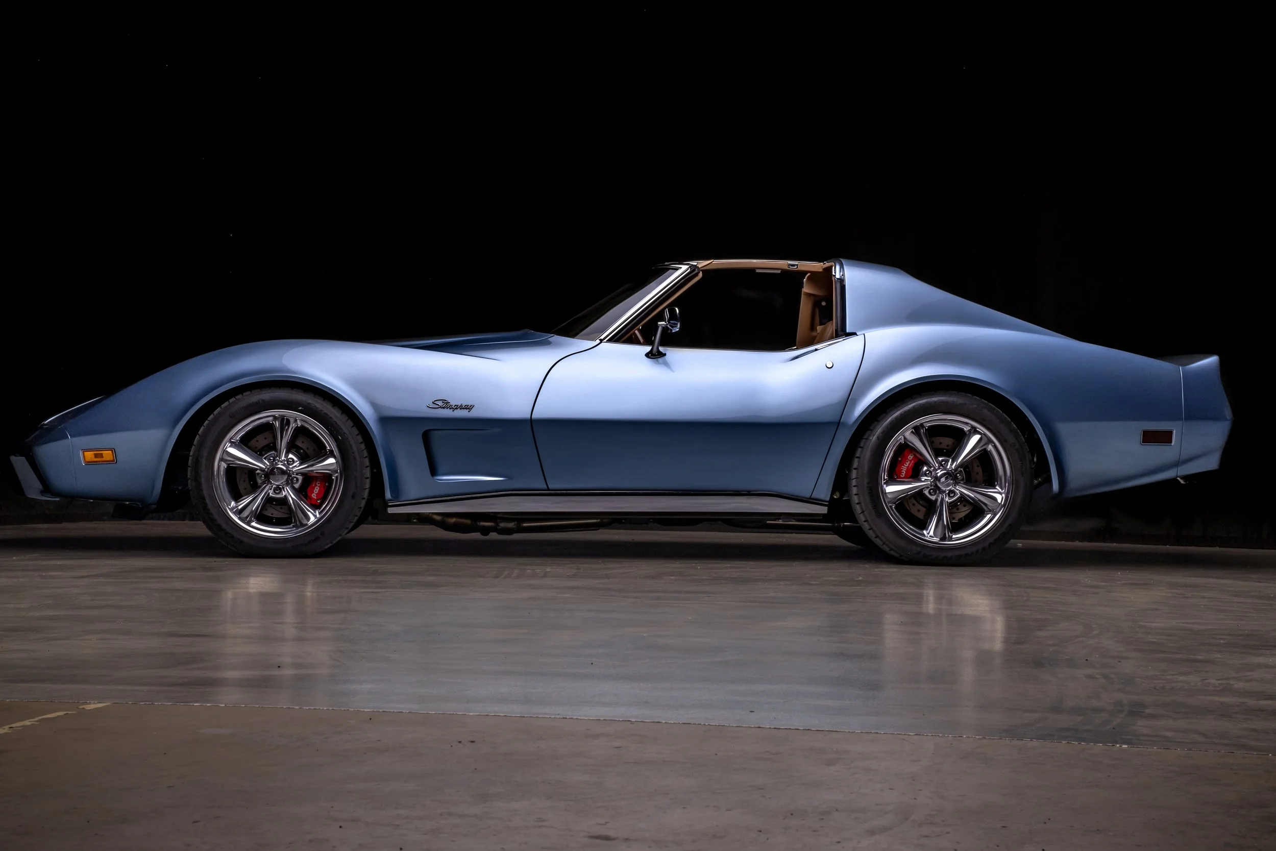 The '75 Schwab Stingray built by County Corvette is finished in a bespoke custom blue paint color. Builtfor the 2024 Charles Schwab Challenge, photographed by Cam Ashman. 1975 Corvette Stingray Custom C3 Corvette Stingray, '75 Vette, Restomod,