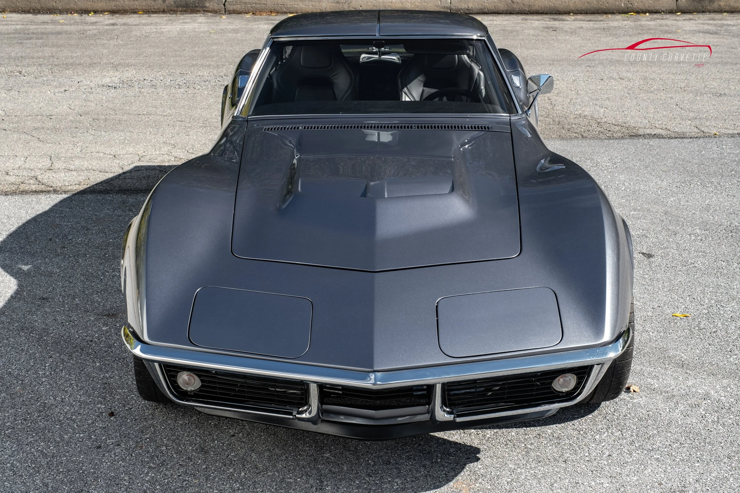Hand built in Pennsylvania by County Corvette. This 1969 Corvette Restomod with 6.2L LS3 V8, Tremec 6-Speed Manual Transmission, and much more. This Chevrolet Corvette wears a custom silver metallic paint, with a black leather interior. Amenities inc