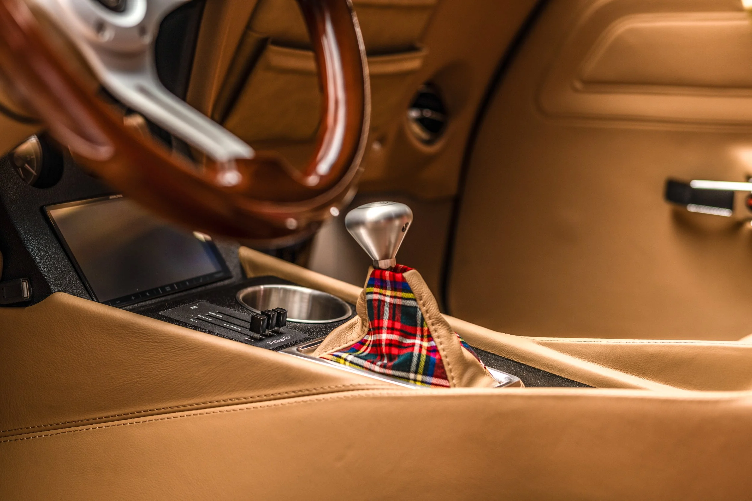 1975 Corvette Restomod built for the 2024 Charles Schwab Challenge by us, County Corvette. '75 Schwab Stingray 1975 Schwab Corvette Stingray Blue, Saddle Tan interior, Tartan Plaid Accents, Custom Car, Custom restomod, hot rod