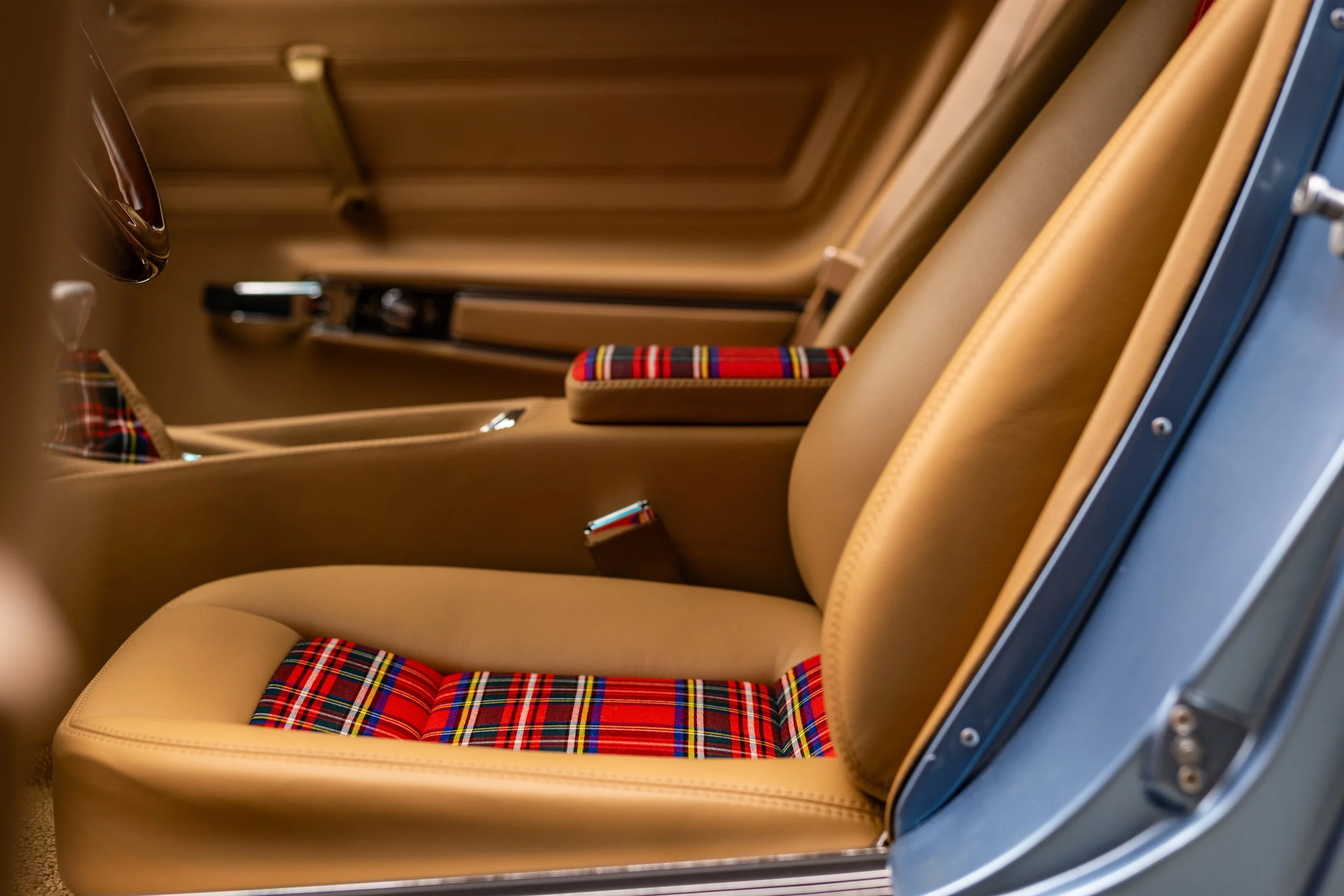 Saddle Tan and Tartan Plaid Interior of the '75 Schwab Corvette Stingray built by County Corvette for the 2024 Charles Schwab Challenge, photographed by Cam Ashman. 1975 Corvette Stingray Restomod, C3 Corvette Stingray, '75 Vette, Restomod