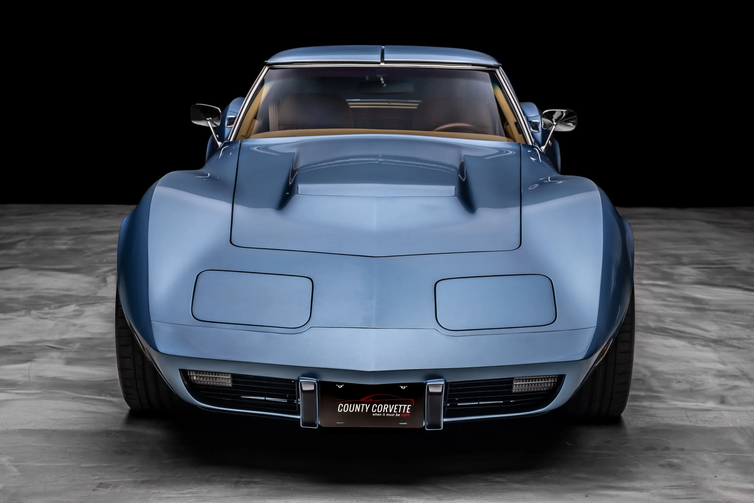 1975 Corvette Restomod built for the 2024 Charles Schwab Challenge by us, County Corvette. '75 Schwab Stingray 1975 Schwab Corvette Stingray Blue, Saddle Tan interior, Tartan Plaid Accents, Custom Car, Custom restomod, hot rod