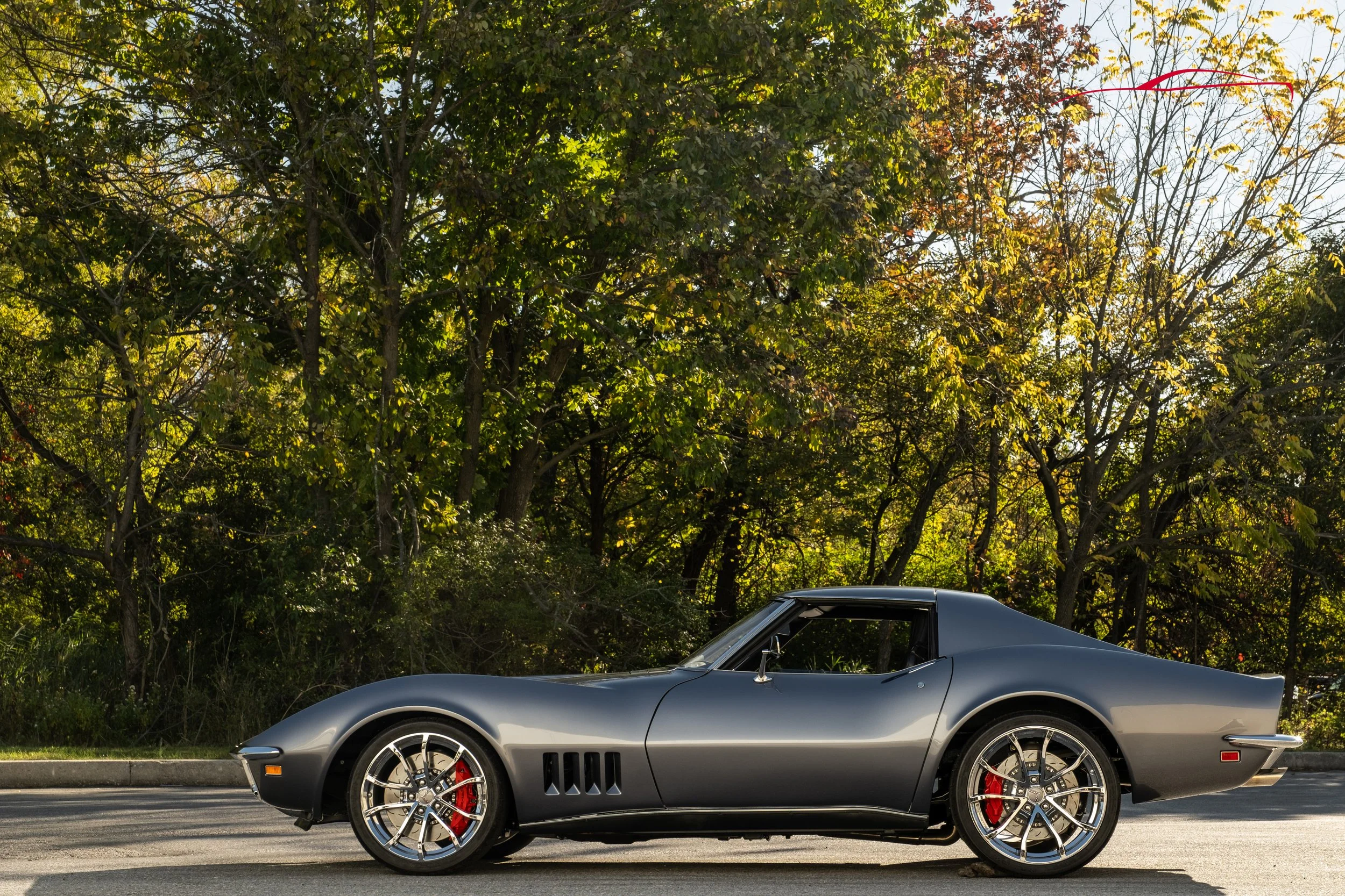 Hand built in Pennsylvania by County Corvette. This 1969 Corvette Restomod with 6.2L LS3 V8, Tremec 6-Speed Manual Transmission, and much more. This Chevrolet Corvette wears a custom silver metallic paint, with a black leather interior. Amenities inc