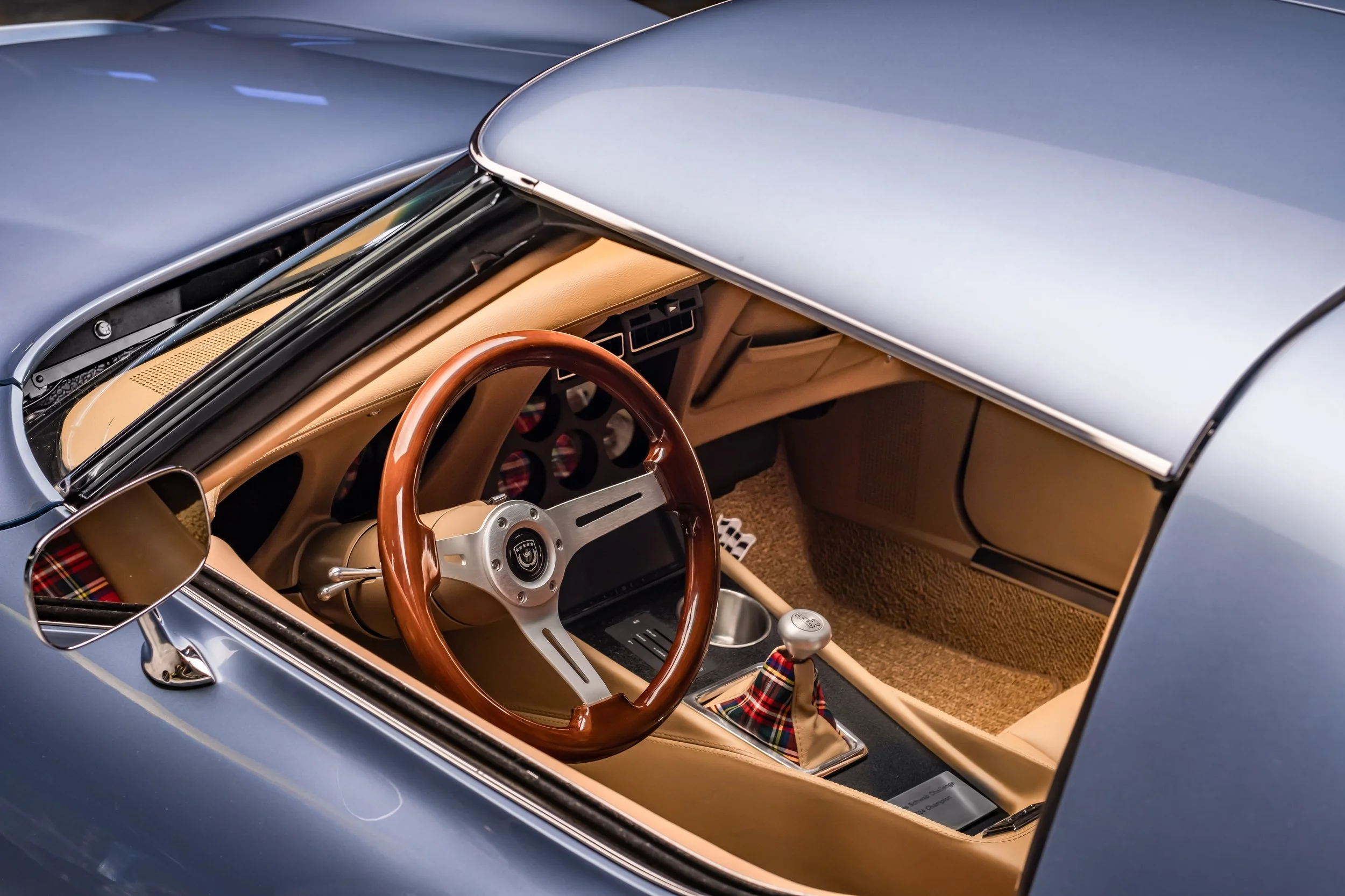 1975 Corvette Restomod built for the 2024 Charles Schwab Challenge by us, County Corvette. '75 Schwab Stingray 1975 Schwab Corvette Stingray Blue, Saddle Tan interior, Tartan Plaid Accents, Custom Car, Custom restomod, hot rod