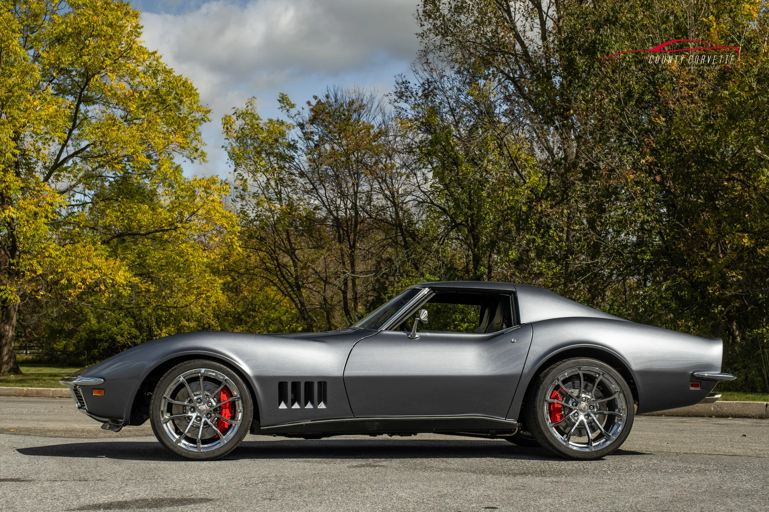 Hand built in Pennsylvania by County Corvette. This 1969 Corvette Restomod with 6.2L LS3 V8, Tremec 6-Speed Manual Transmission, and much more. This Chevrolet Corvette wears a custom silver metallic paint, with a black leather interior. Amenities inc