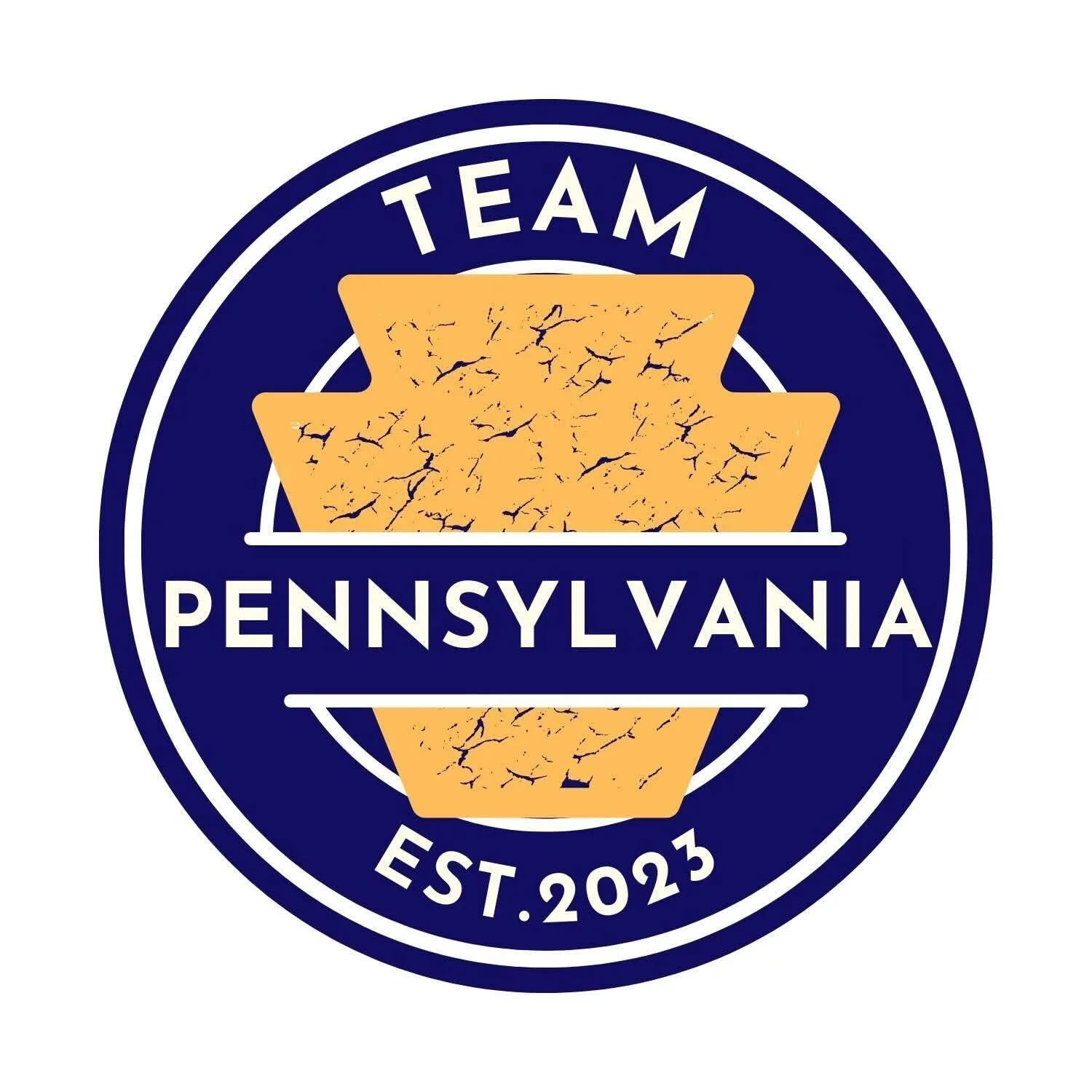 Logo for Team Pennsylvania featuring a circular design with a navy blue background, yellow crackers, and white text reading 'Team Pennsylvania EST. 2023.'
