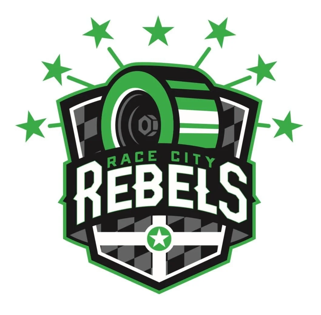 Logo for Race City Rebels featuring a stylized green and black race tire with stars in a circular pattern around it, and the text 'Race City Rebels'.