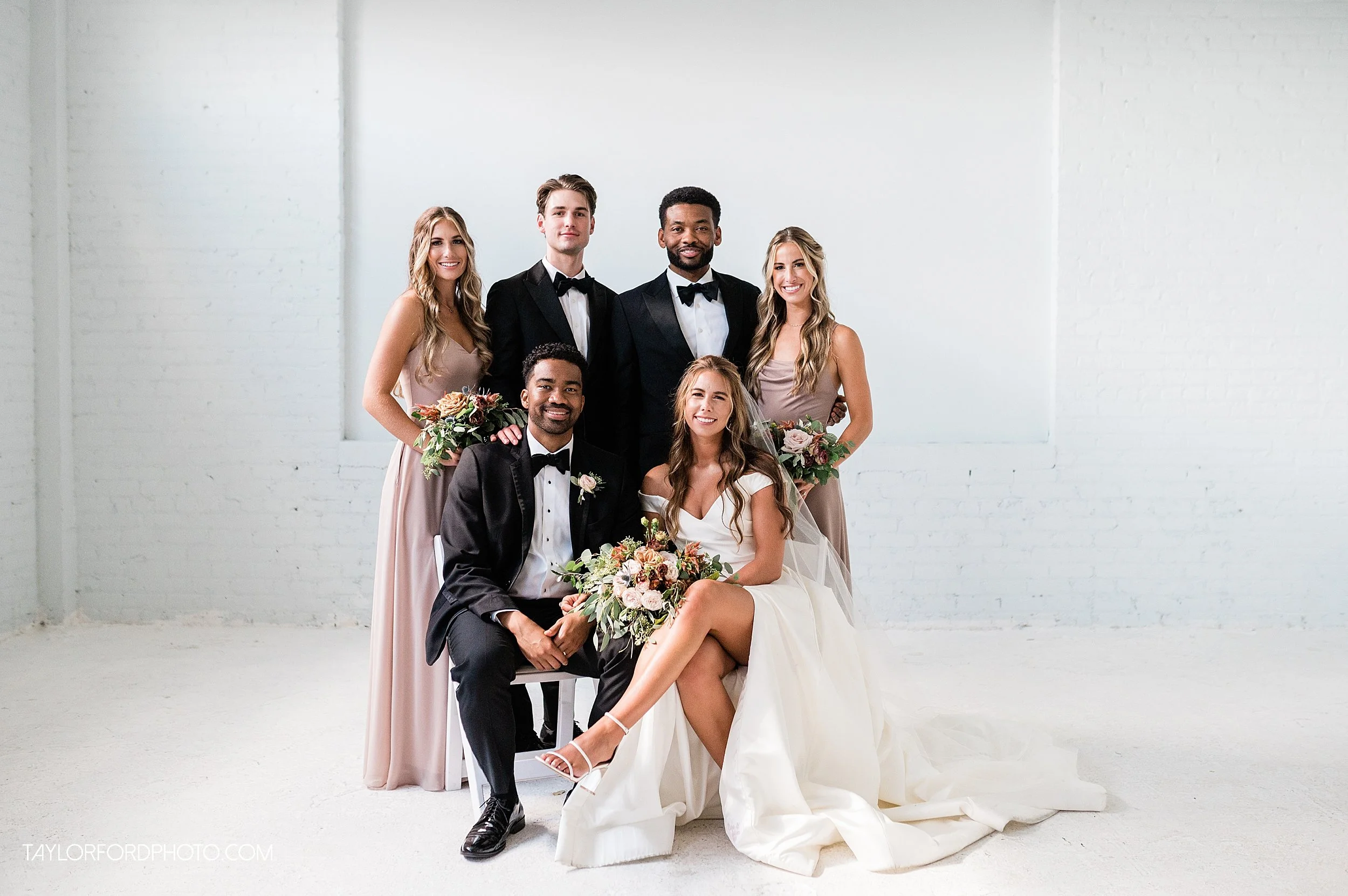 downtown-wells-street-fort-wayne-indiana-punch-films-reception-ruby-moon-floral-cambria-events-headwaters-park-lajune-marie-bridal-dress-wedding-photographer-taylor-ford-photography-llc-_2135.jpg