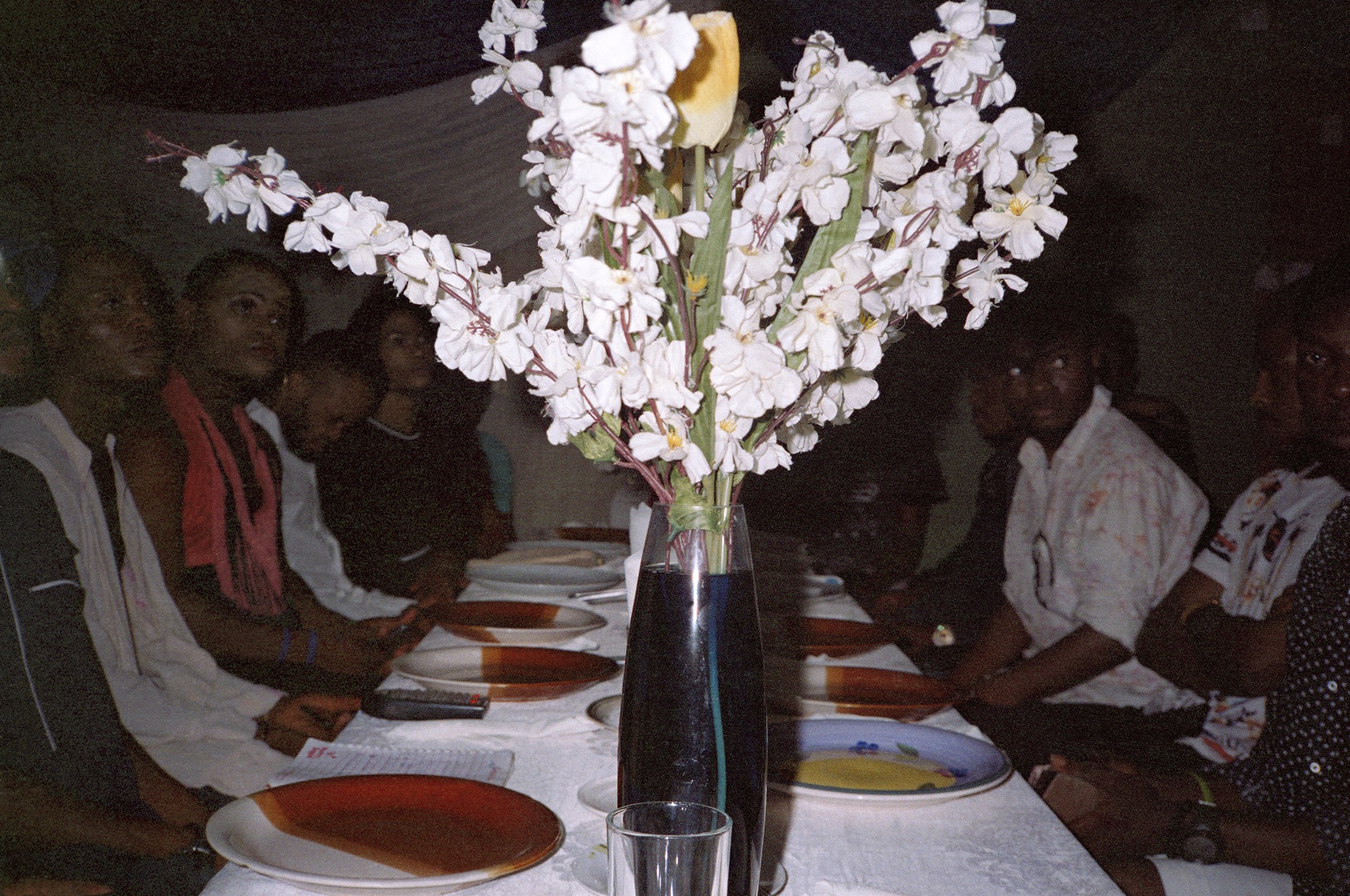 A-farewell-dinner-with-Daniel--Ruby--James-Brown--Tonnex--Thom-Smith--Mohammed--Sodiq--Mr-Morrison--Lil-B--Olumide--Icon--Nonso-2019-Hand-printed-silver-gelatin-print.jpeg