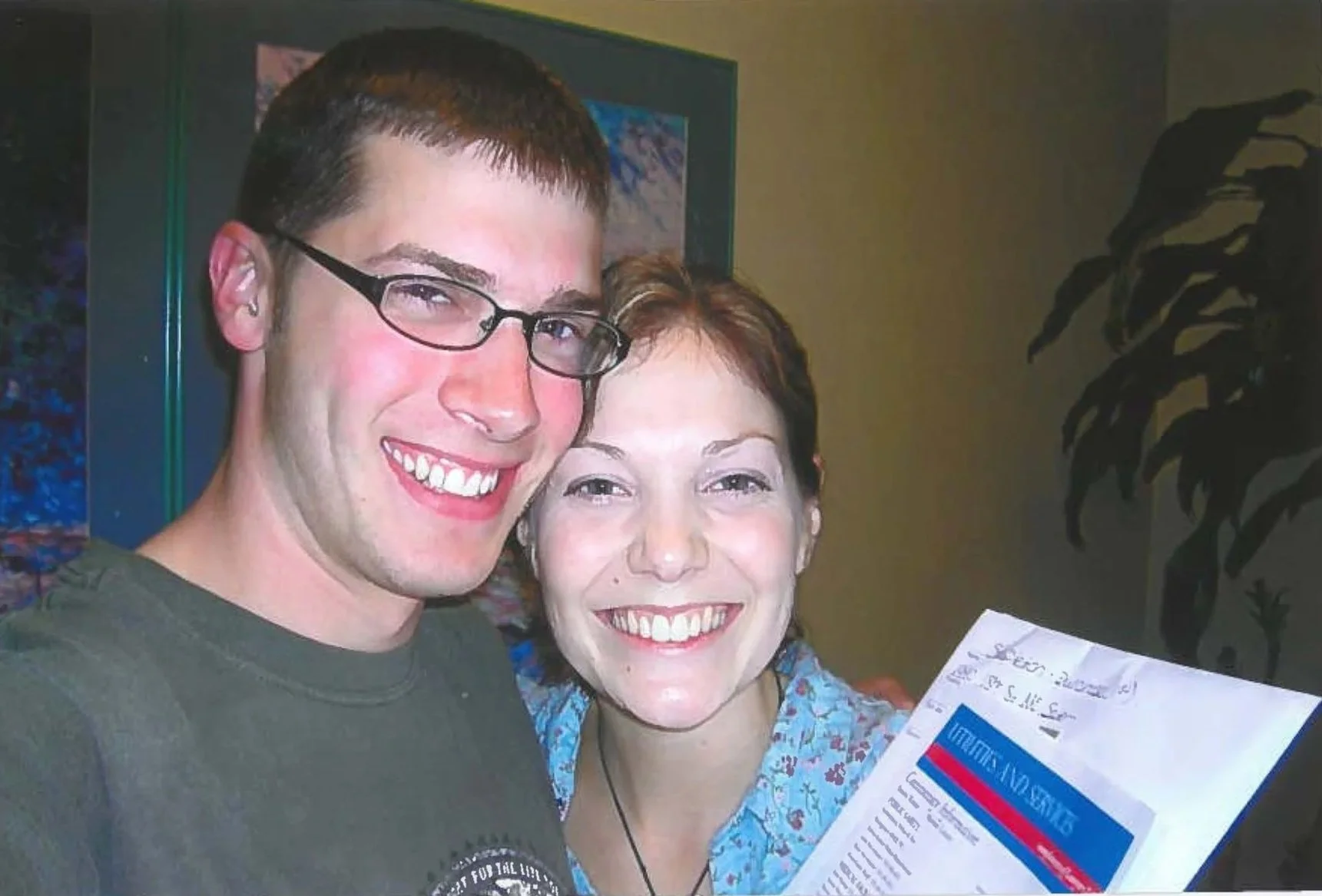 Isaak and Virginia signing for their first home