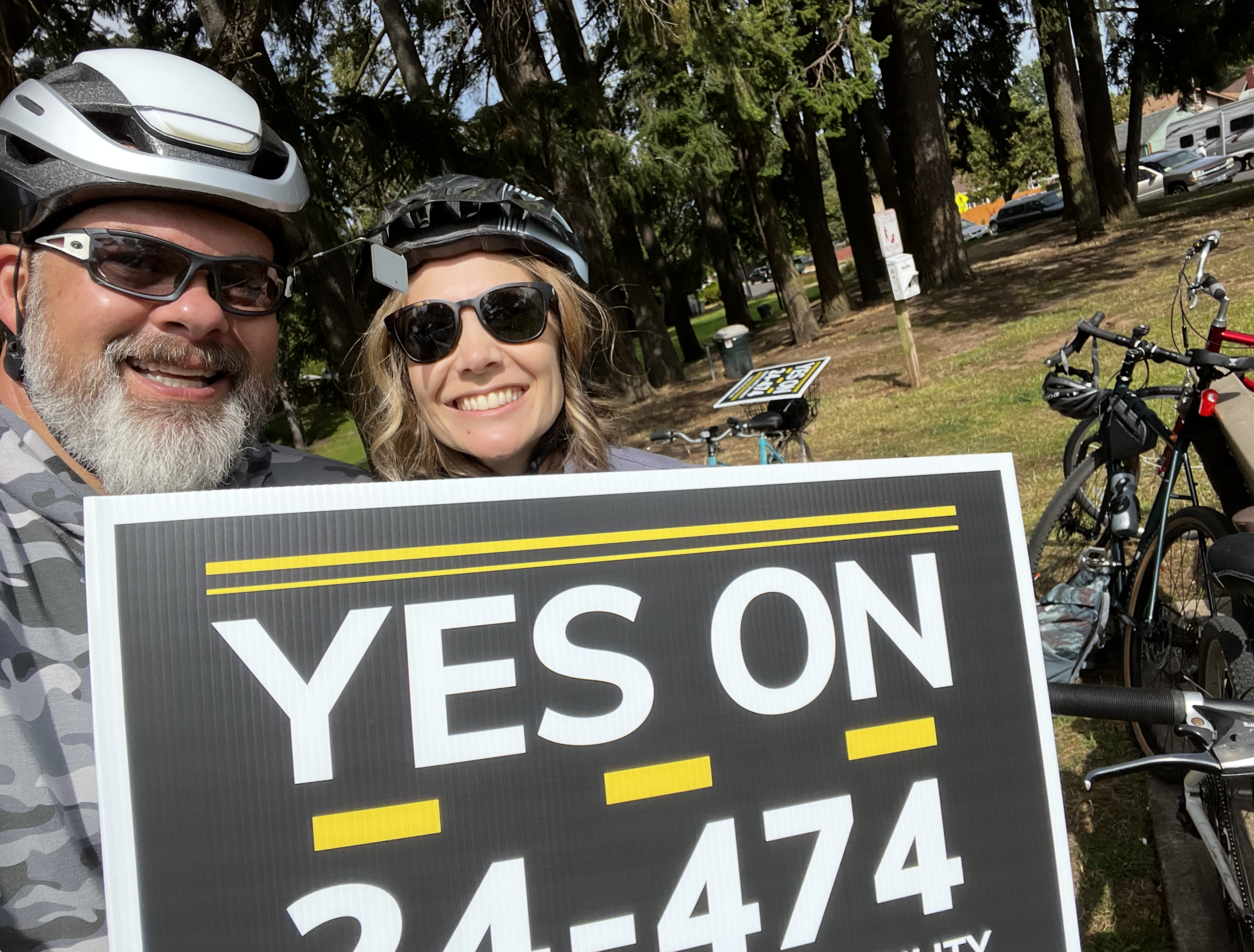 Virginia and Mayor Chris Hoy bike canvassing to pass the 300M infrastructure bond
