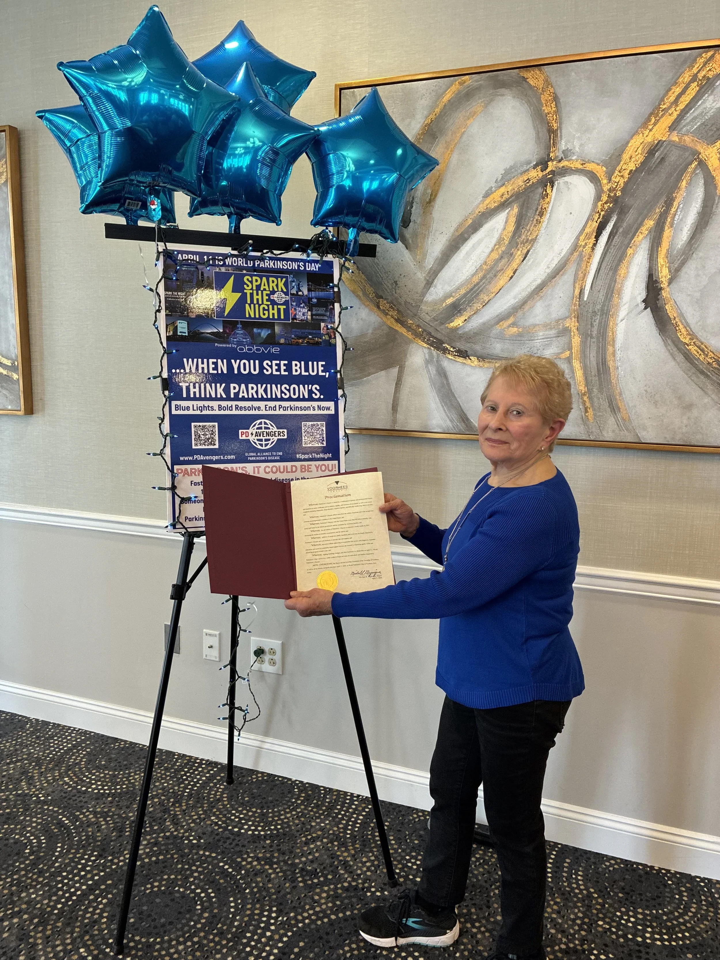 Barbara LiBove holds a proclamation from Voorhees Township
