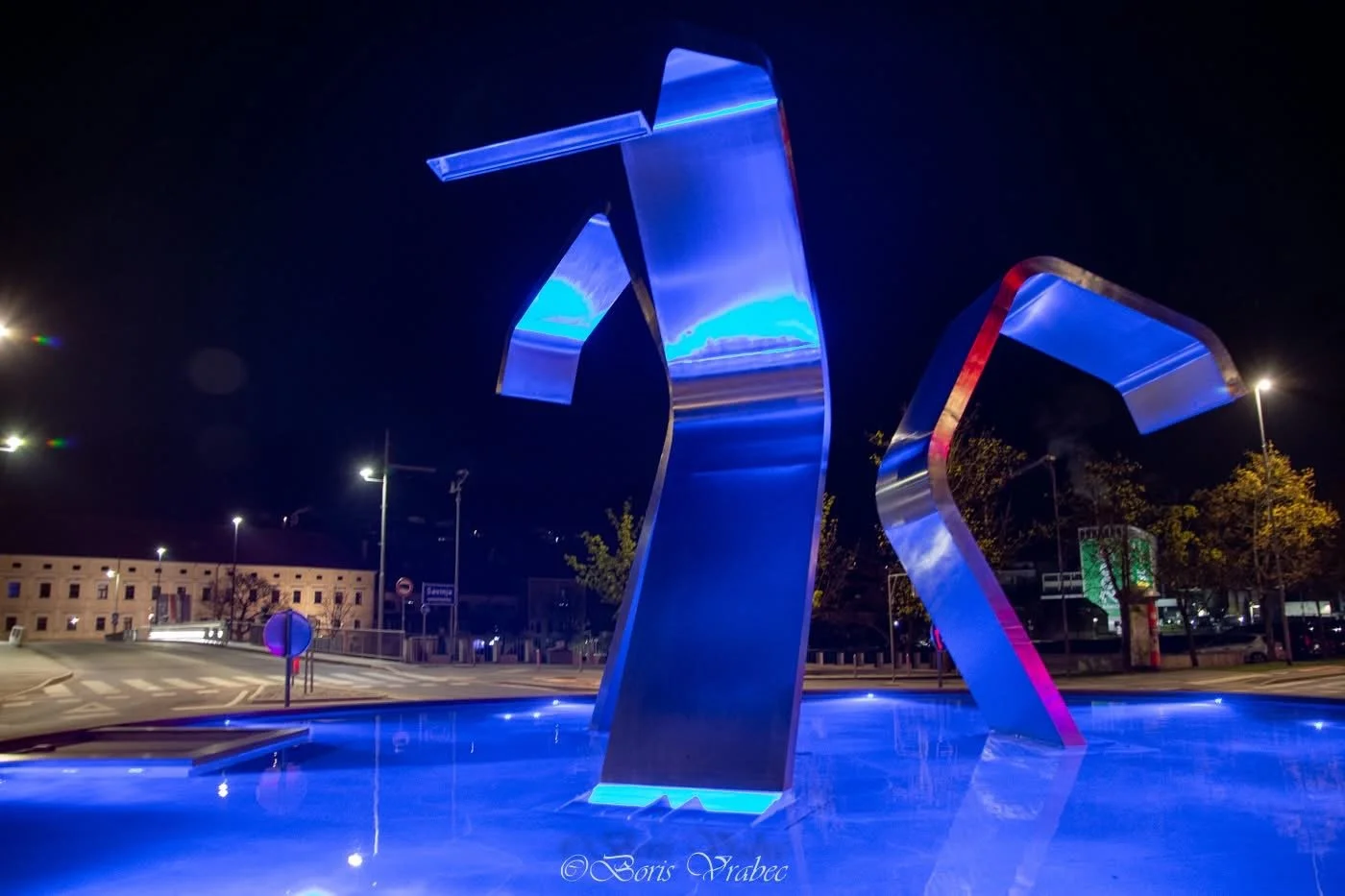 This is in Slovenia, and the photographer credit Boris Vrabec helps narrow it down.
This sculpture is in Laško, a small spa town in eastern Slovenia. 

Photo Credit: Boris Vrabec