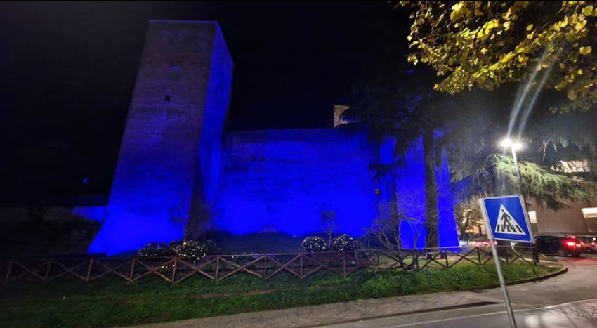 The Rocca lights up blue; Rocca dei Perugini 