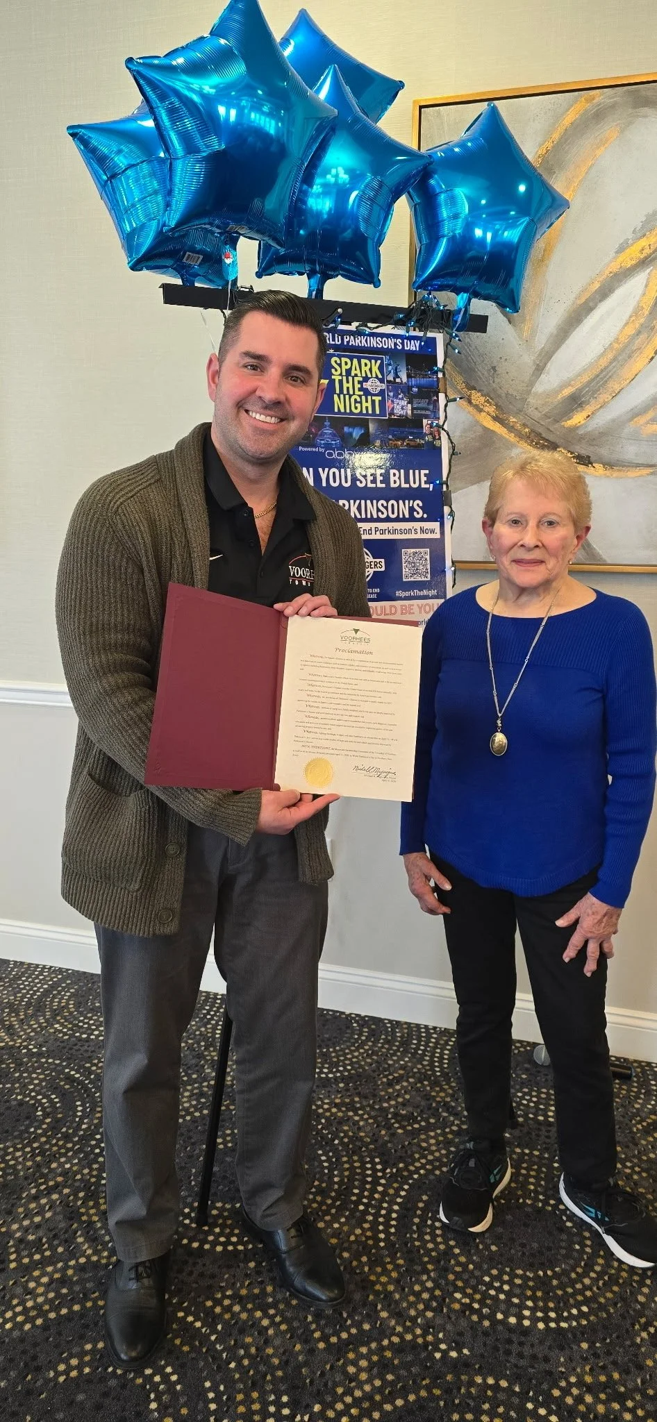 Barbara LiBove is presented with a proclamation from Voorhees Township