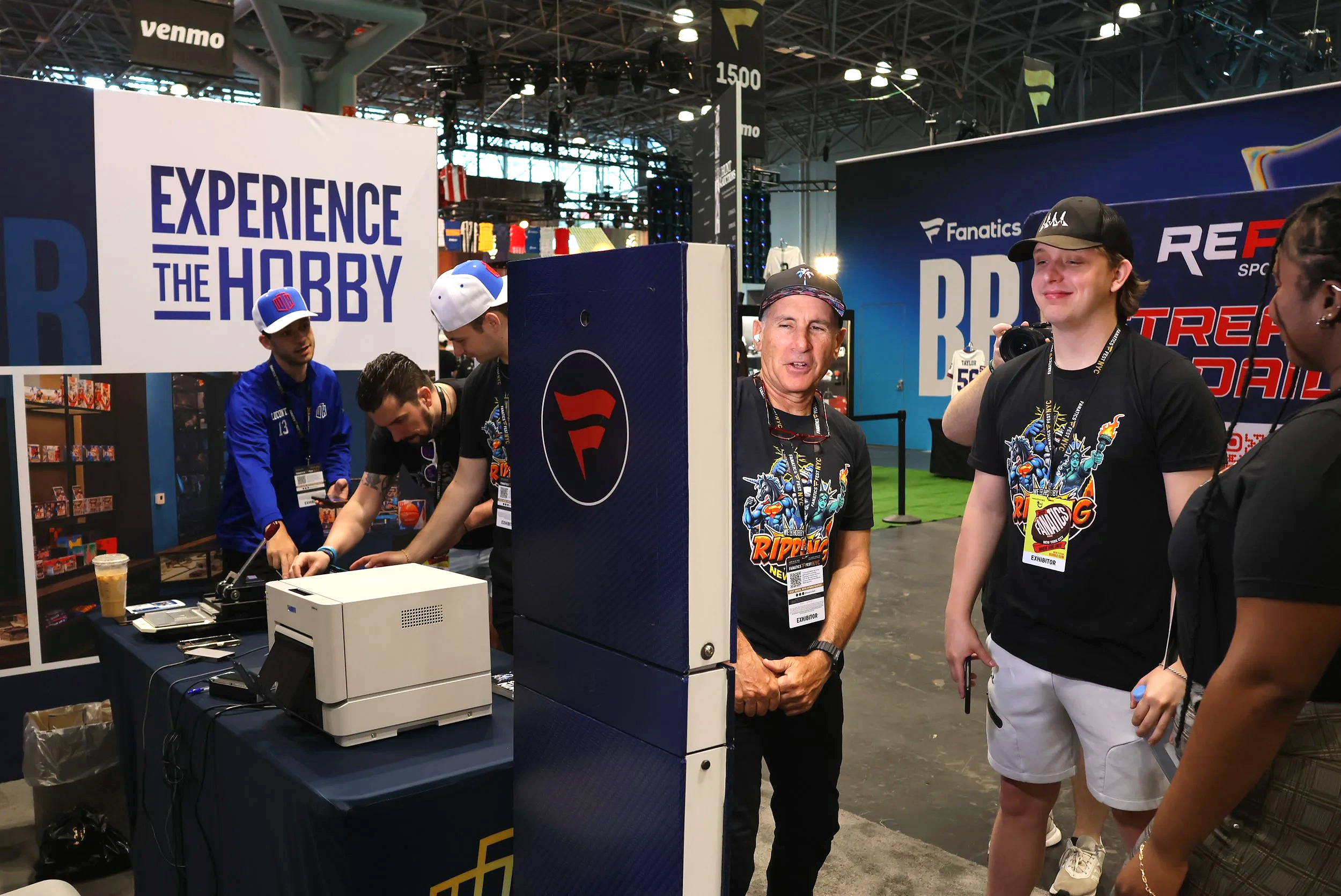 Crowd at the WeTheHobby Fotoboyz custom sports card station during Fanatics Fest NYC