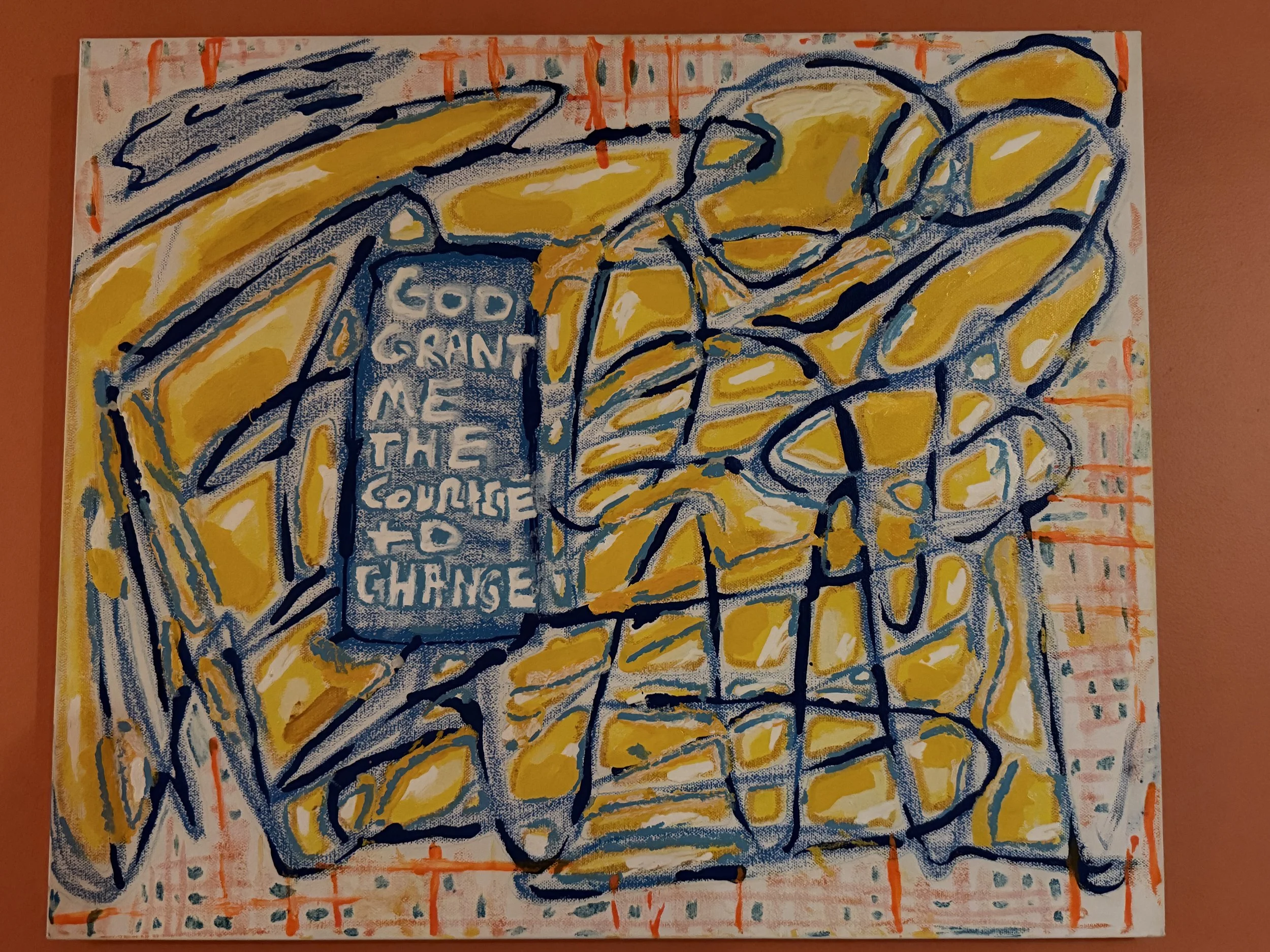 Abstract painting with yellow and blue colors, featuring some text that reads, 'COOD GAIN THE CHANGE' on a blue background, with orange and red accents on the edges.