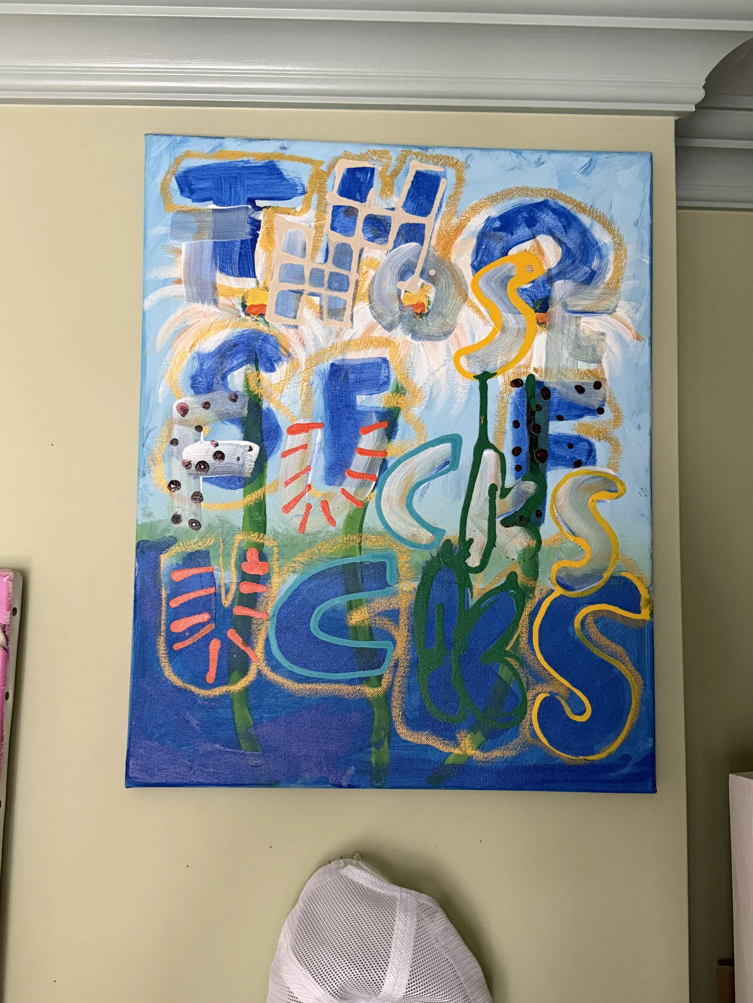 Colorful abstract painting on a wall with blue shapes, green, yellow, red accents, and swirling lines.